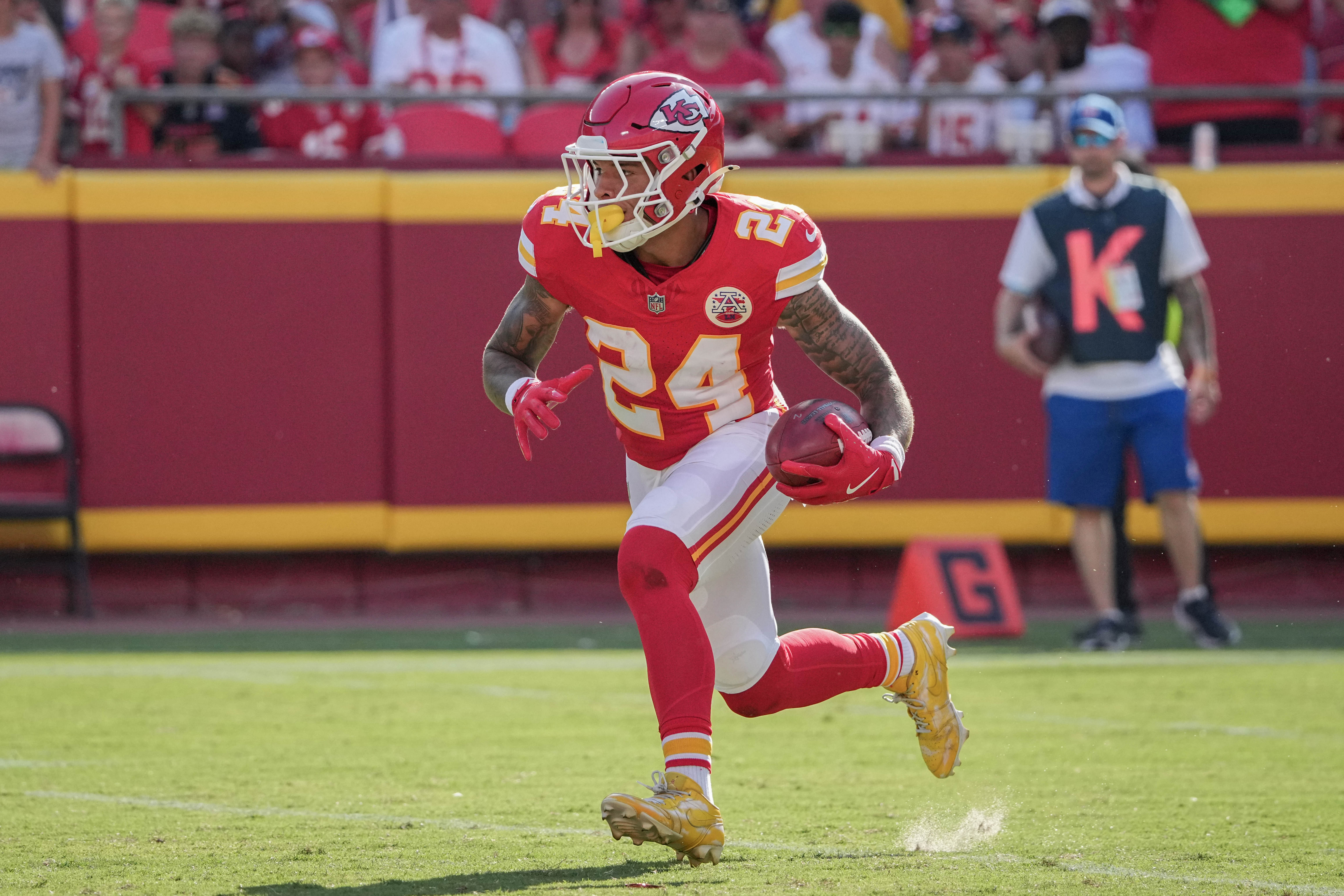 Aug 17, 2024; Kansas City, Missouri, USA; Kansas City Chiefs wide receiver Skyy Moore (24) runs the ball against the Detroit Lions during the game at GEHA Field at Arrowhead Stadium.