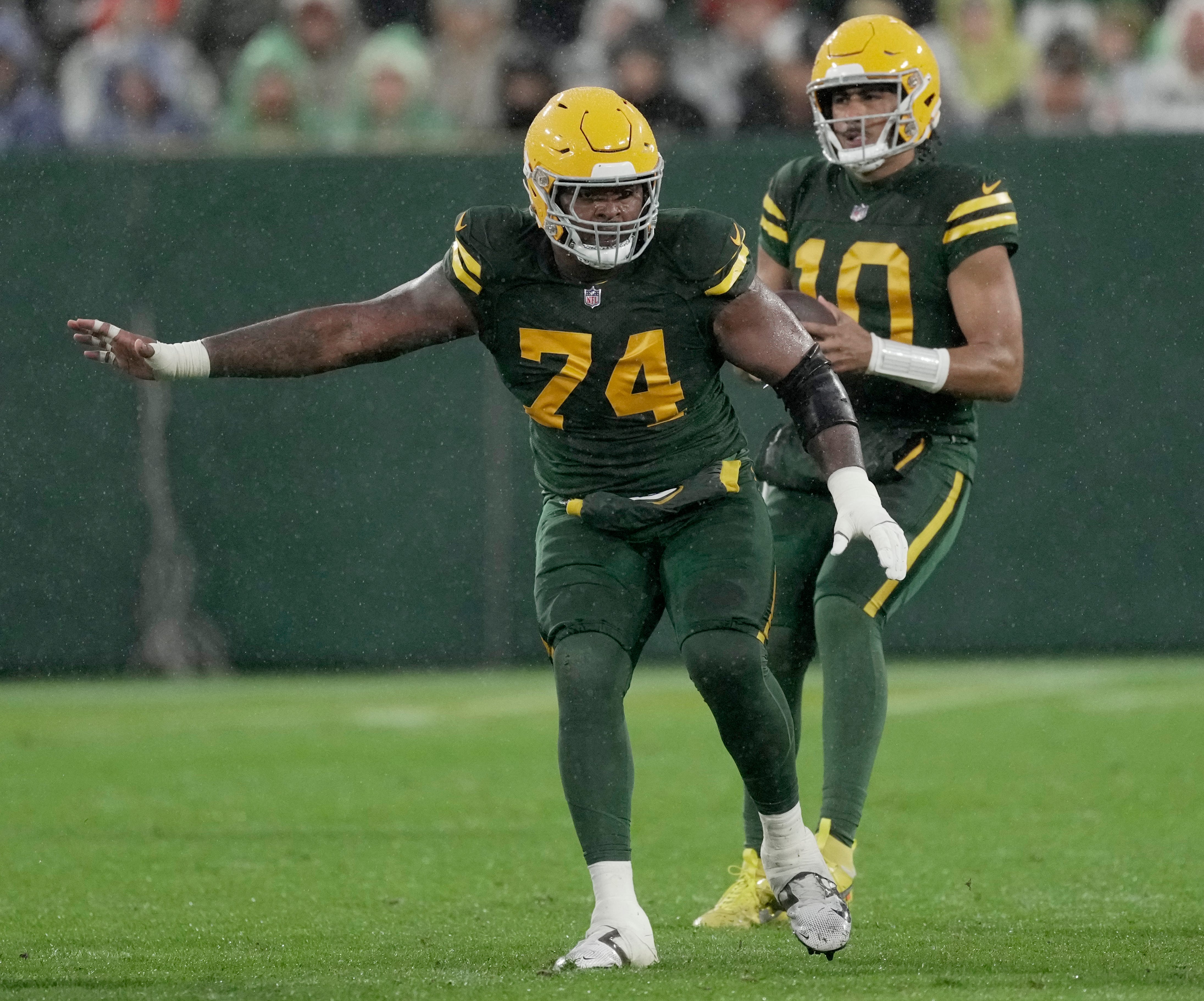 Green Bay Packers guard Elgton Jenkins (74) provides pass protection during the second quarter of their game against Detroit Lions Sunday, November 3, 2024 at Lambeau Field in Green Bay, Wisconsin
