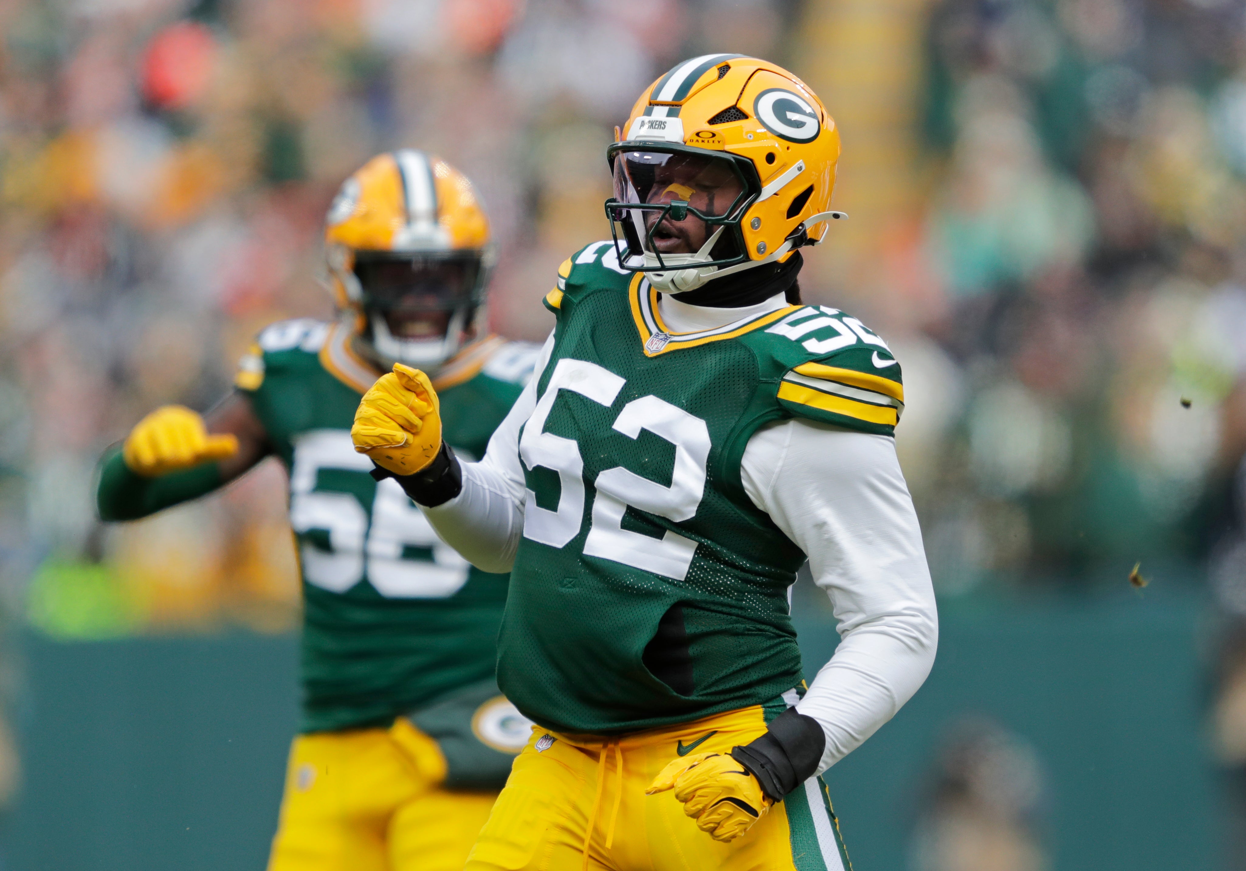 Green Bay Packers defensive end Rashan Gary (52) celebrates after sacking Chicago Bears quarterback Caleb Williams (18) in the first quarter at Lambeau Field.