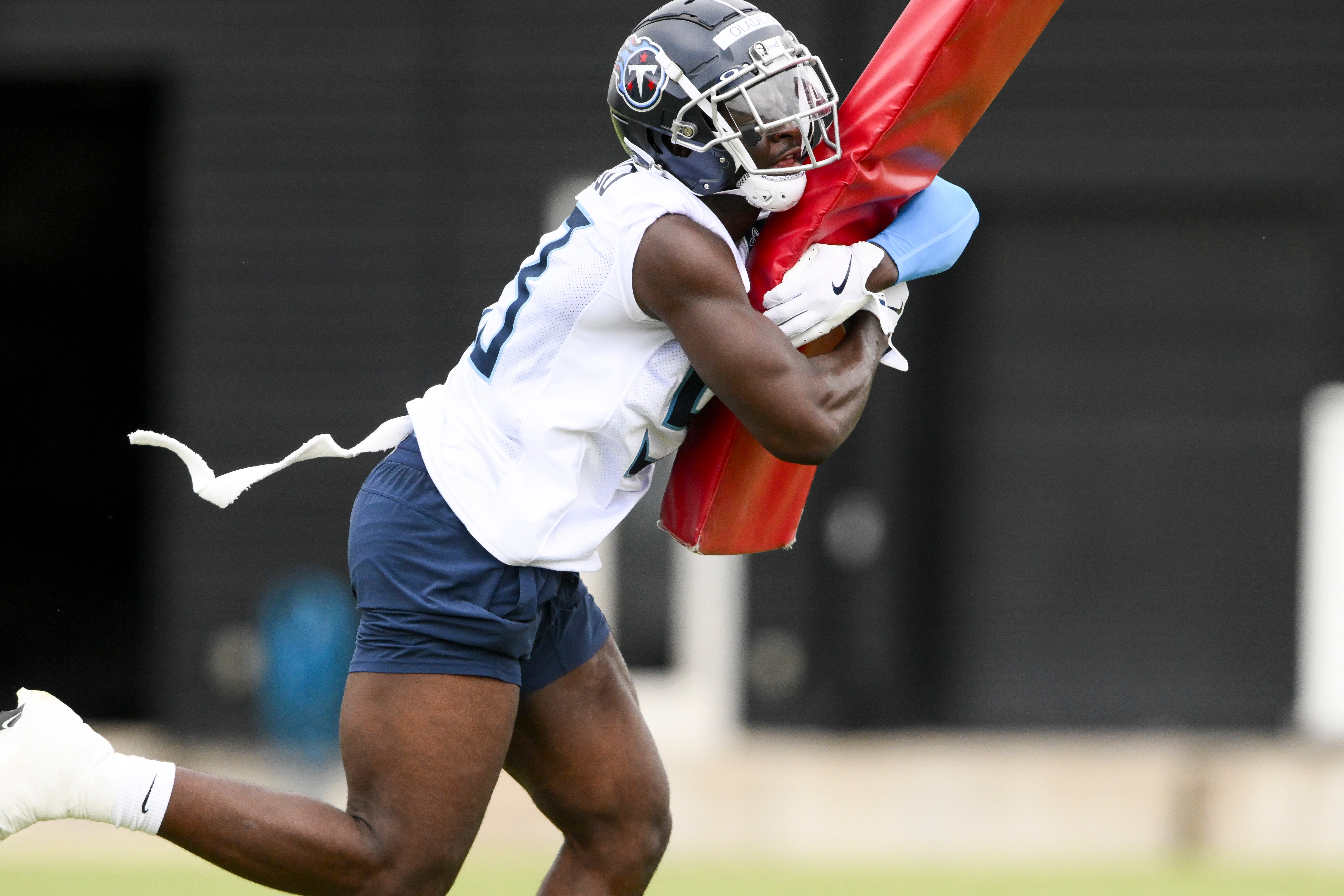 May 10, 2025; Nashville, TN, USA; Tennessee Titans outside linebacker Oluwafemi Oladejo (53) goes through drills during Rookie Mini Camp at Saint Thomas Sports Park. Mandatory Credit: Steve Roberts-Imagn Images