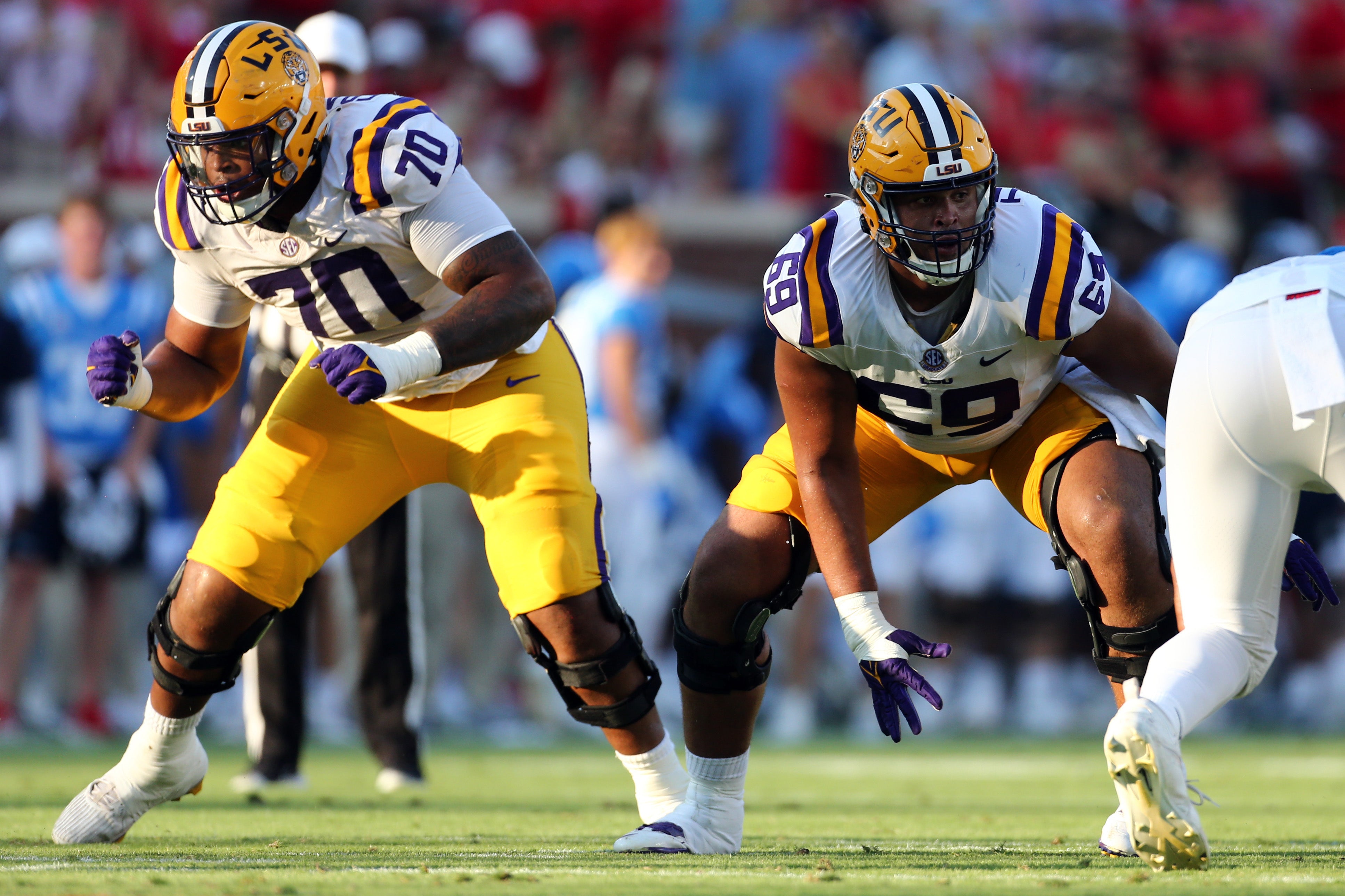 Sep 30, 2023; Oxford, Mississippi, USA; LSU Tigers offensive linemen Miles Frazier (70) and Charles Turner III (69) block during the first half against the Mississippi Rebels at Vaught-Hemingway Stadium.
