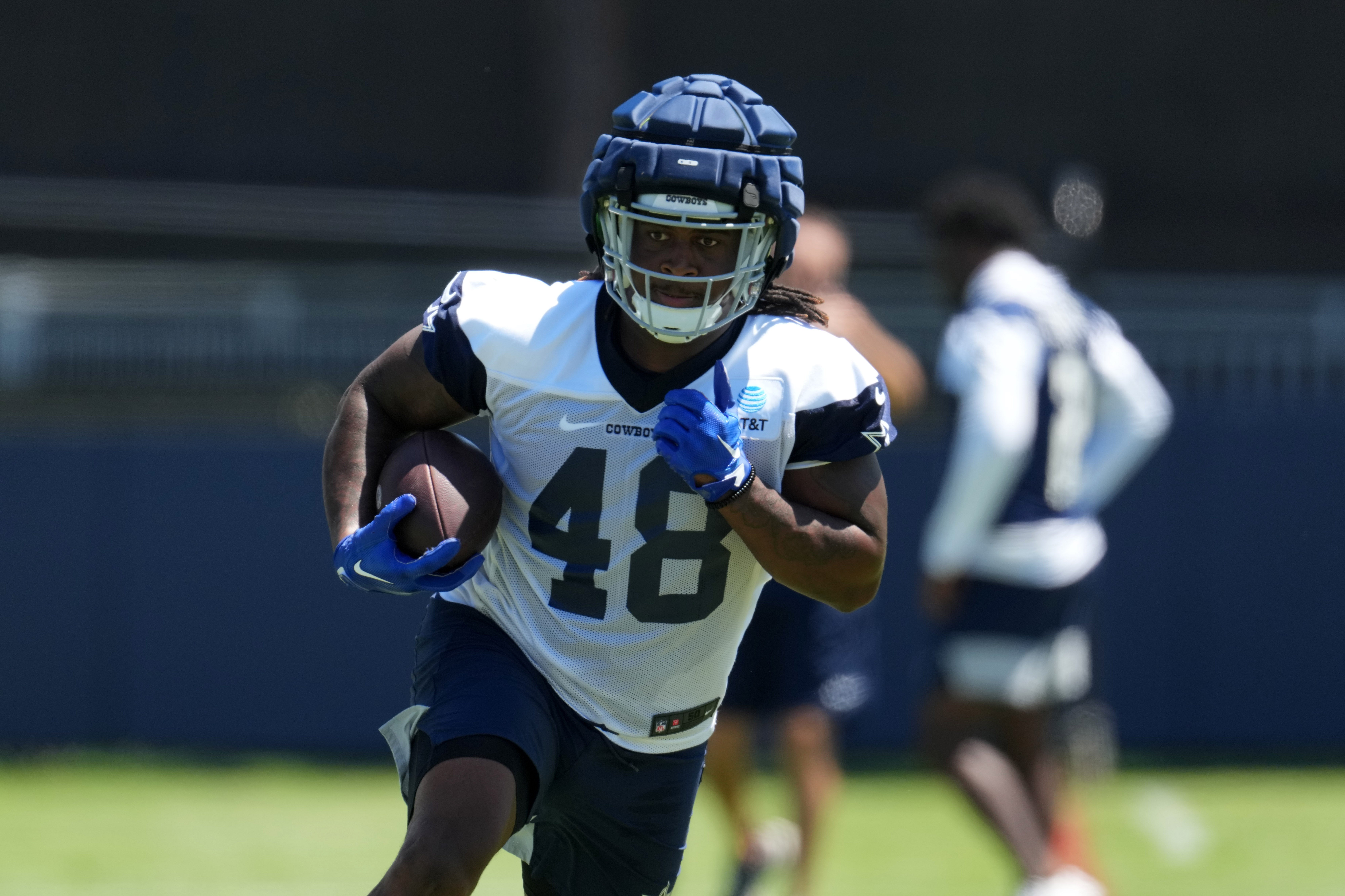 Dallas Cowboys tight end Princeton Fant (48) wears a Guardian helmet cap during training camp at Marriott Residence Inn-River Ridge Playing Fields.
