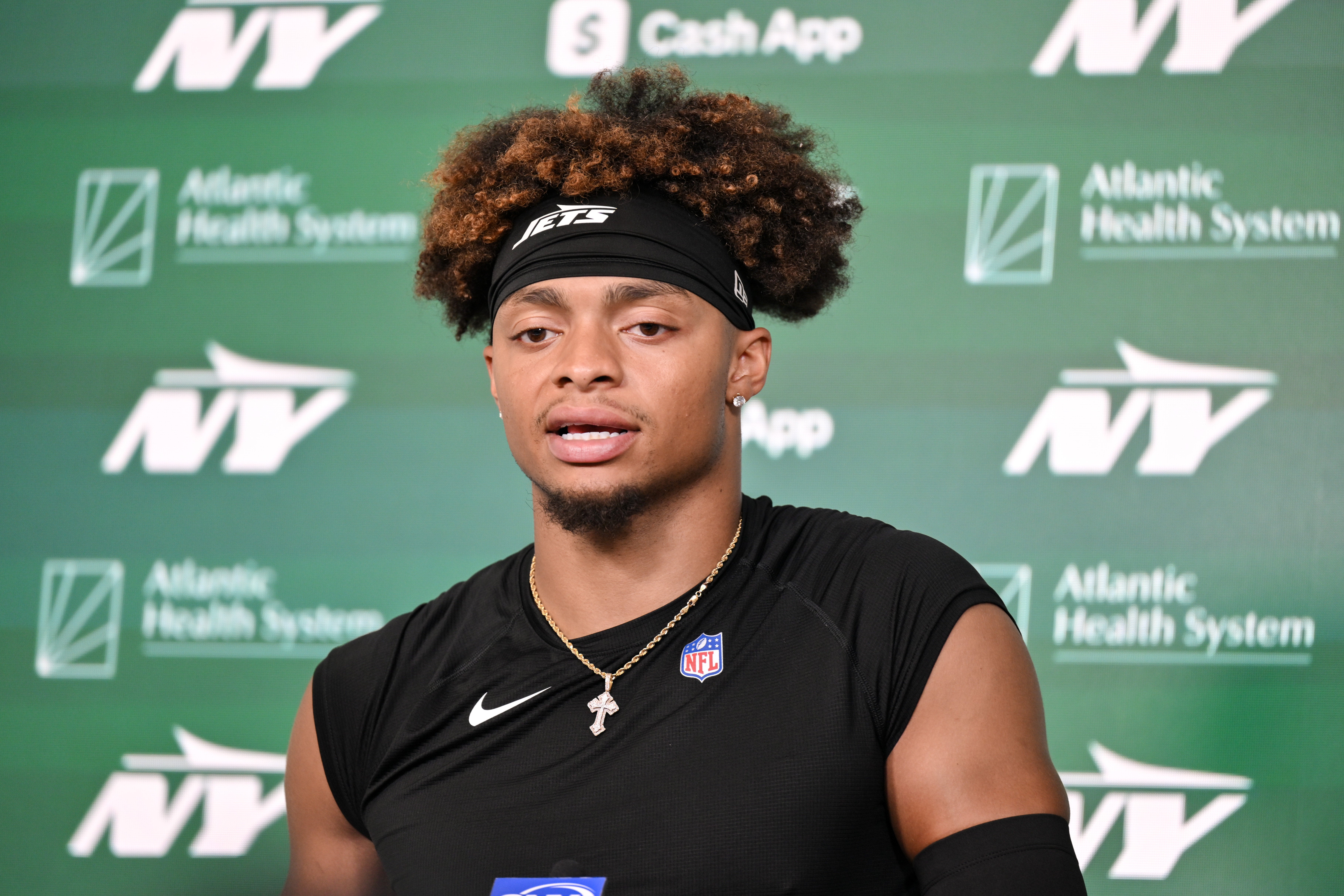 New York Jets quarterback Justin Fields (7) speaks at a press conference during minicamp at Atlantic Health Jets Training Center.