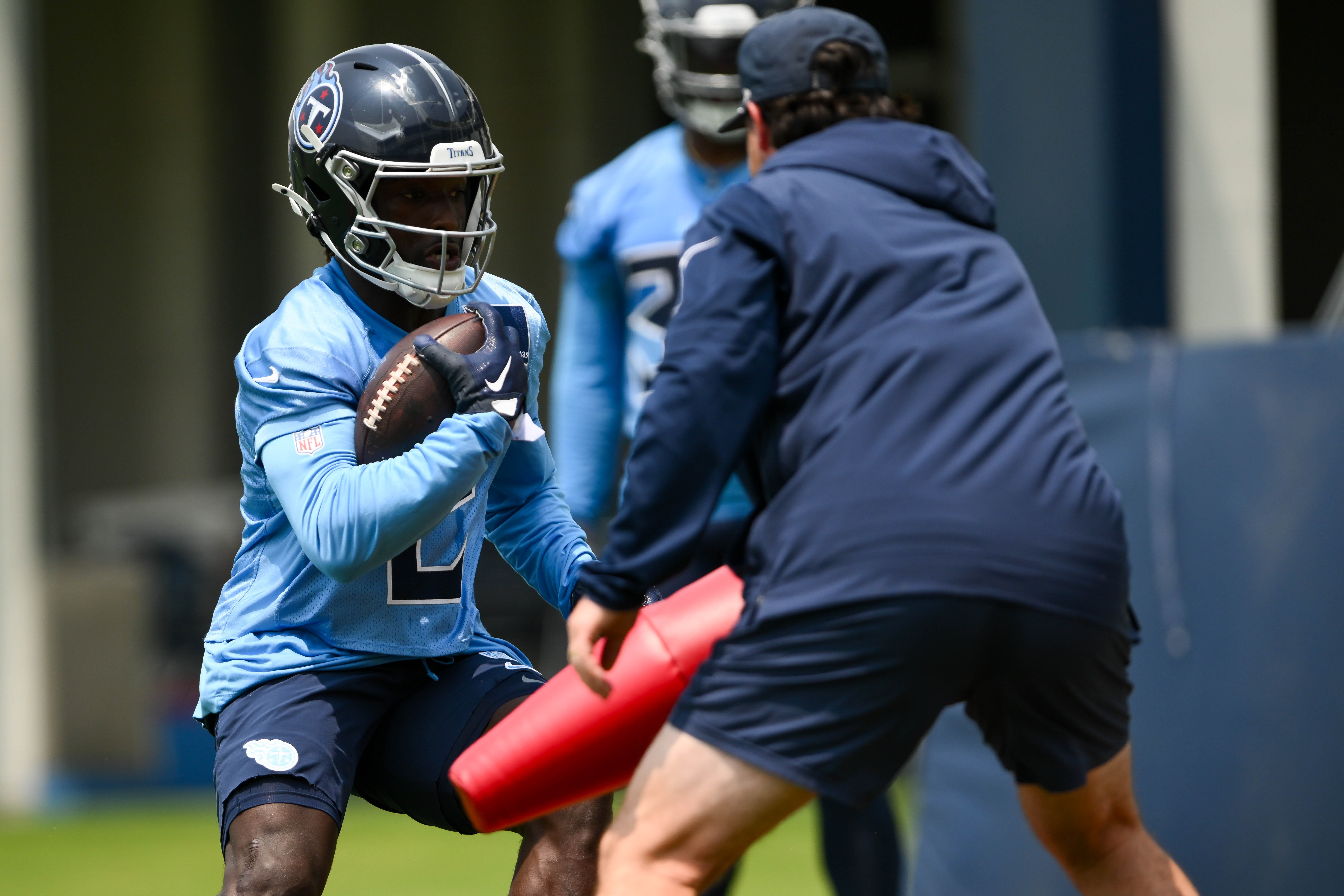Jun 10, 2025; Nashville, TN, USA; Tennessee Titans running back Tyjae Spears (2) goes through running drills during minicamp at Nissan Stadium. Mandatory Credit: Steve Roberts-Imagn Images