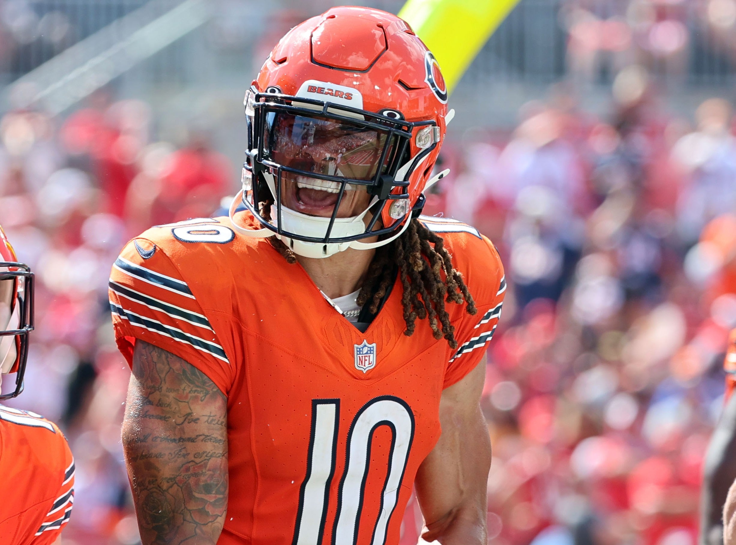 Sep 17, 2023; Tampa, Florida, USA; Chicago Bears wide receiver Chase Claypool (10) celebrates after he scores a touchdown against the Tampa Bay Buccaneers during the second half at Raymond James Stadium.