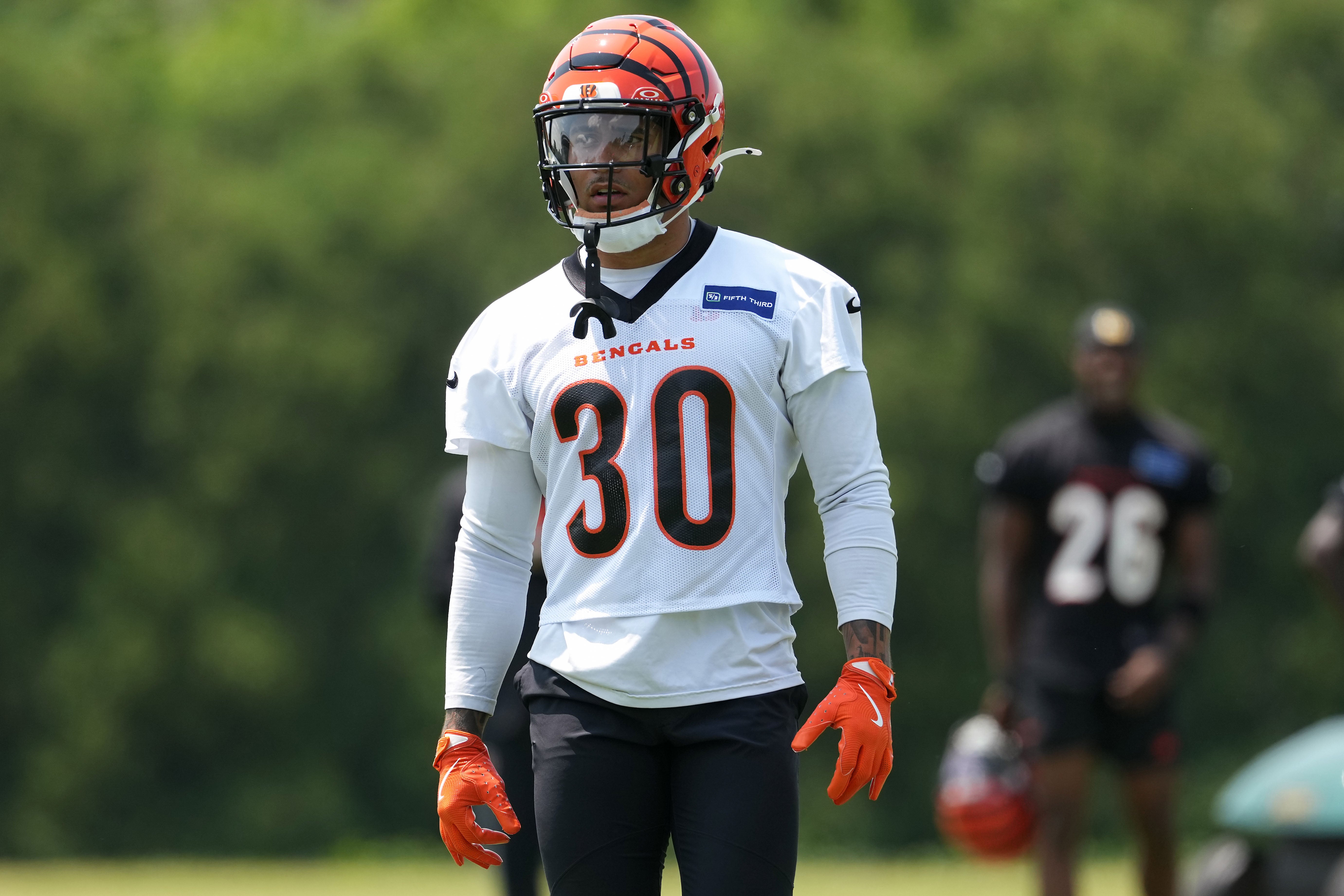 Jun 10, 2025; Cincinnati, OH, USA; Cincinnati Bengals running back Chase Brown (30) walks to the line of scrimmage during practice at Paycor Stadium.