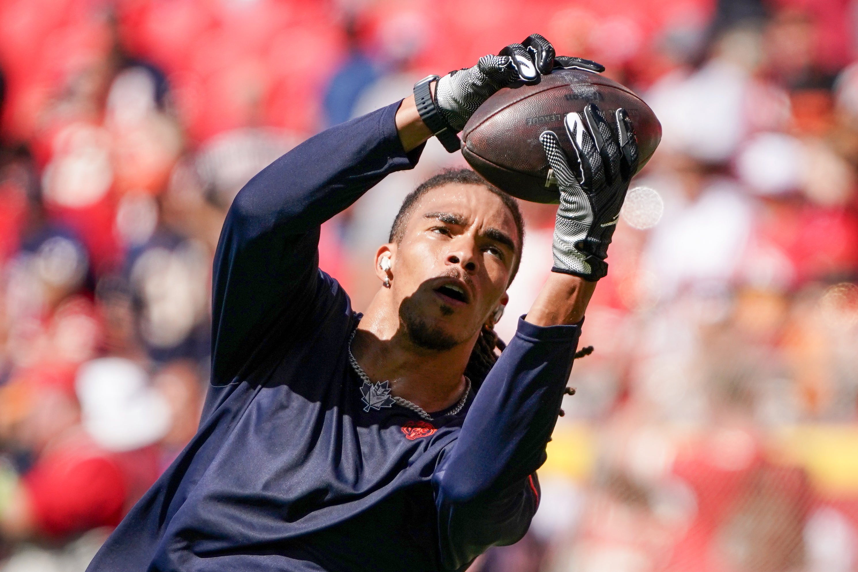 Chicago Bears wide receiver Chase Claypool (10) warms up against the Kansas City Chiefs prior to a game at GEHA Field at Arrowhead Stadium.