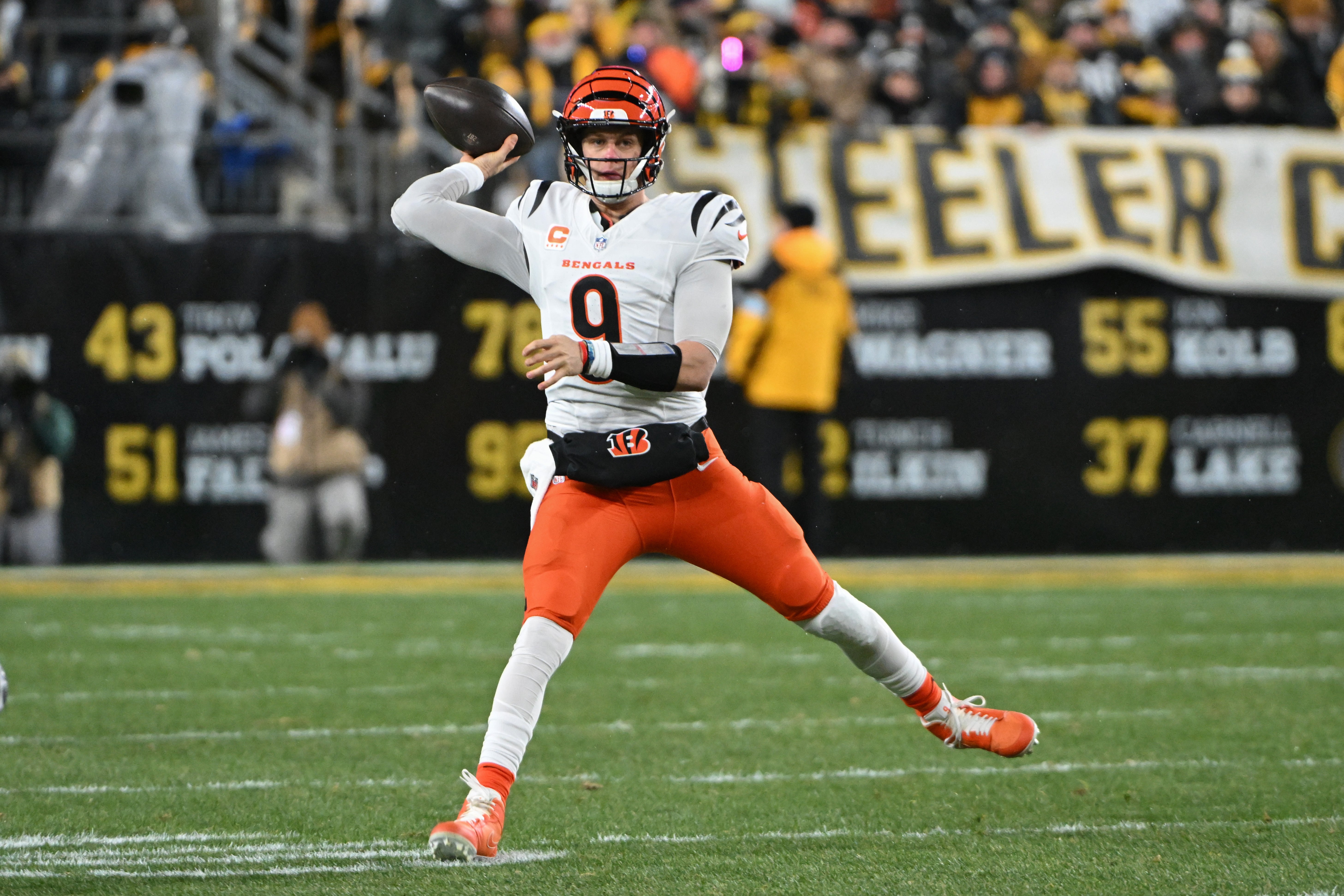 Jan 4, 2025; Pittsburgh, Pennsylvania, USA; Cincinnati Bengals quarterback Joe Burrow (9) throws a pass against the Pittsburgh Steelers during the first quarter at Acrisure Stadium.