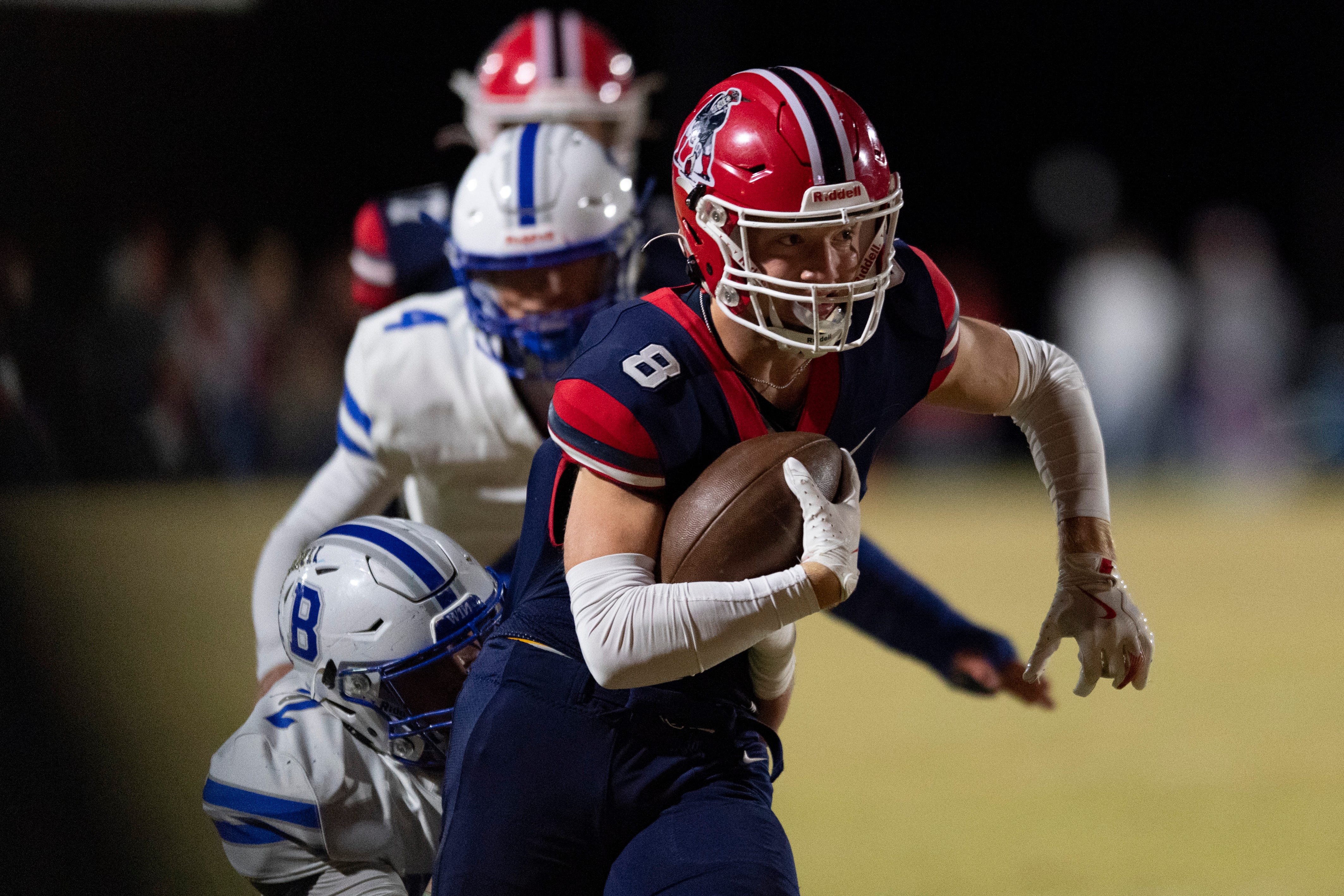 Heritage Hills' Tyler Ruxer (8) runs the ball as the Heritage Hills Patriots play the Batesville Bulldogs during the IHSAA Class 3A football semistate game at Heritage Hills High School in Lincoln City, Ind., Friday, Nov 22, 2024.