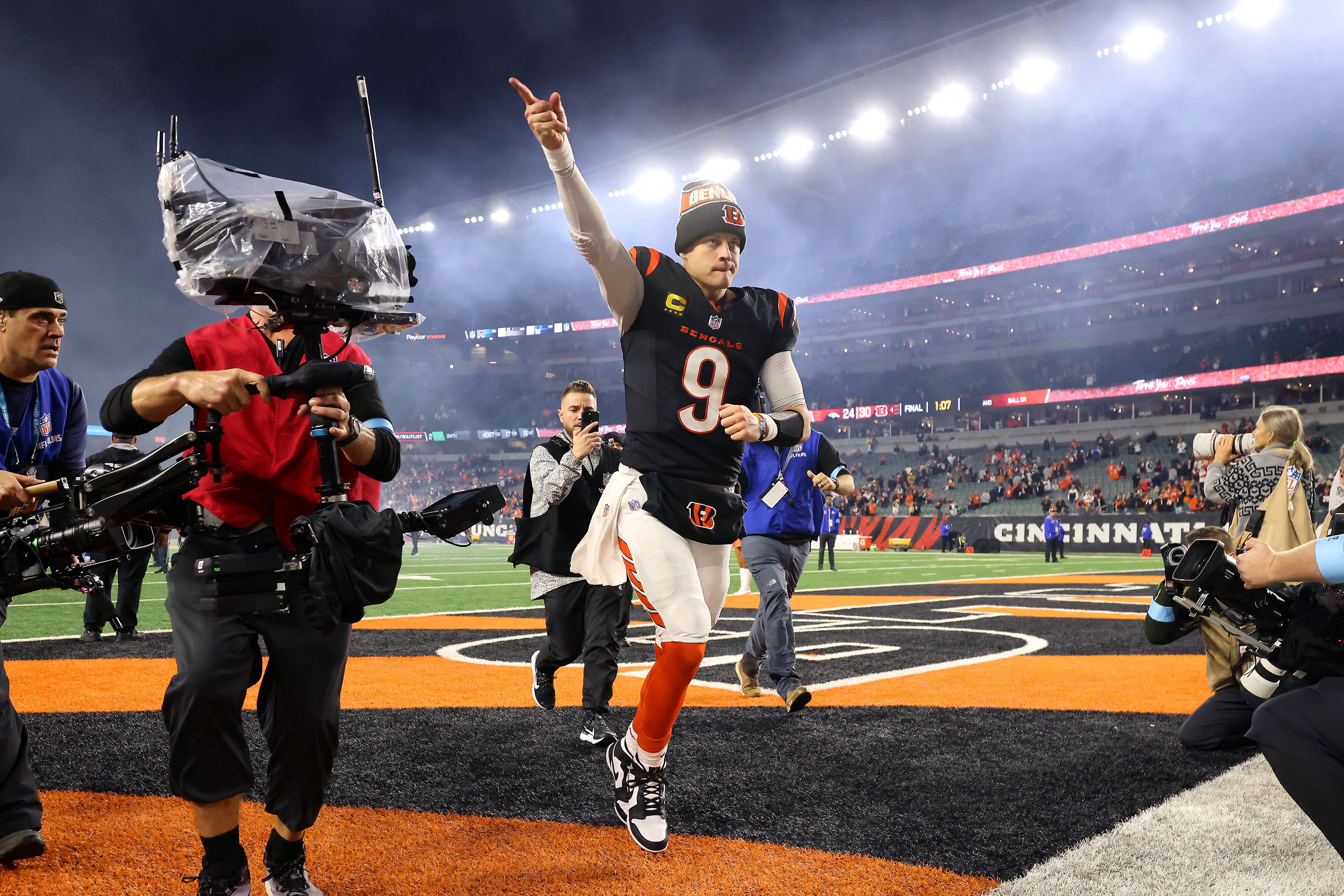 Dec 28, 2024; Cincinnati, Ohio, USA; Cincinnati Bengals quarterback Joe Burrow (9) celebrates following the overtime win against the Denver Broncos at Paycor Stadium.
