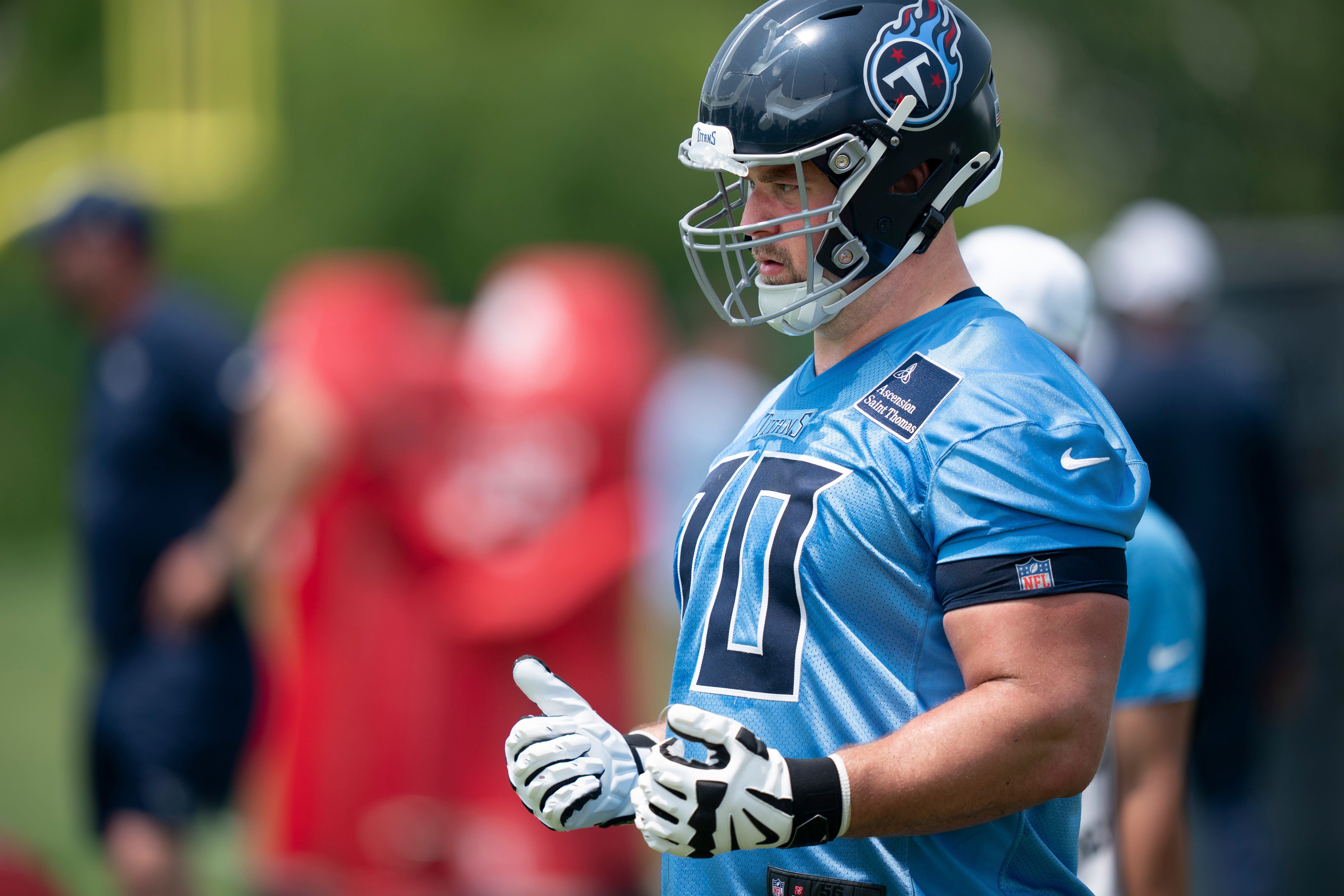 Tennessee Titans guard Kevin Zeitler (70) goes through drills during mandatory Titans Minicamp at Ascension Saint Thomas Sports Park in Nashville, Tenn., Tuesday, June 10, 2025.
