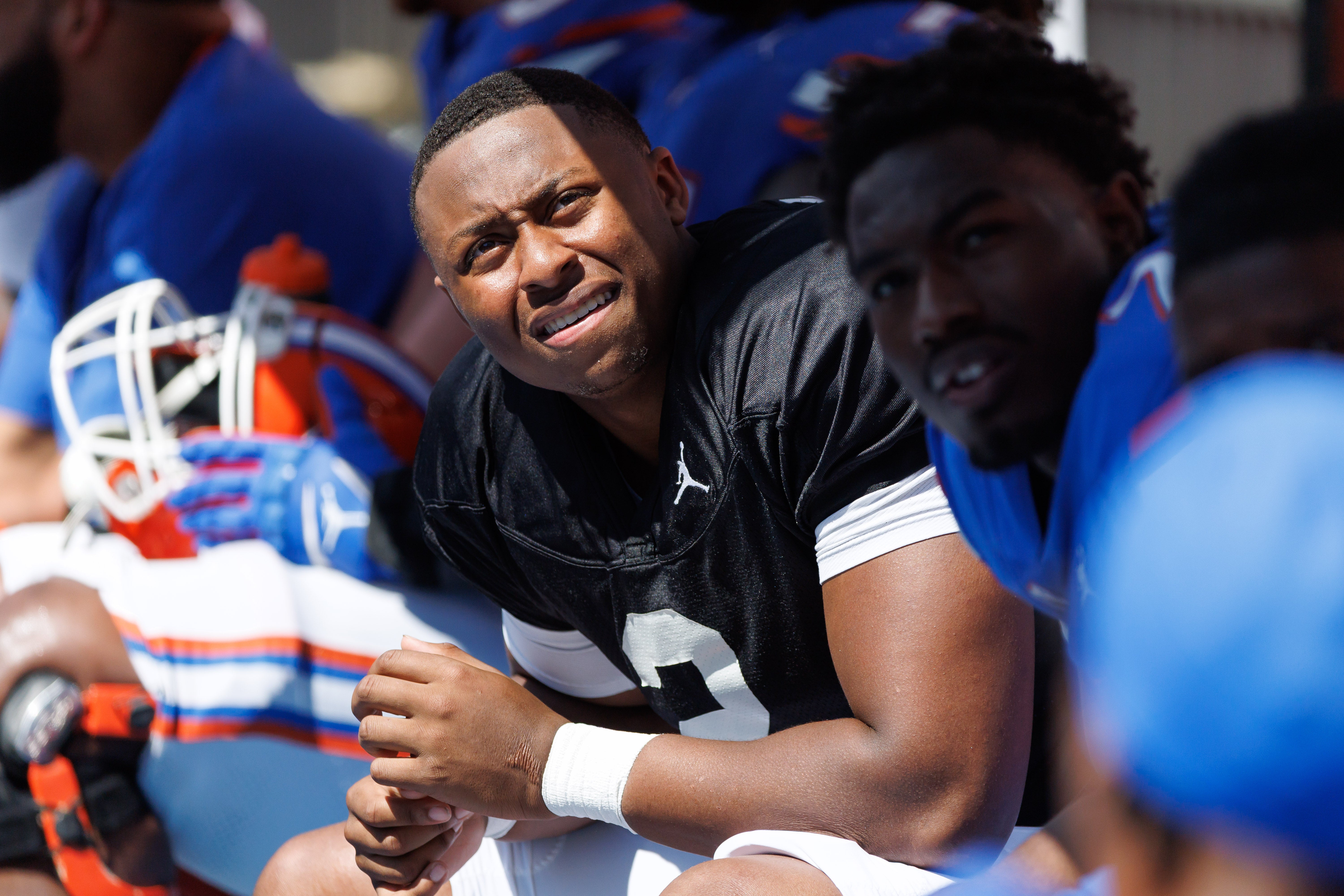Apr 12, 2025; Gainesville, FL, USA; Florida Gators quarterback DJ Lagway (2) looks at the scoreboard from the bench during the second half at Ben Hill Griffin Stadium.