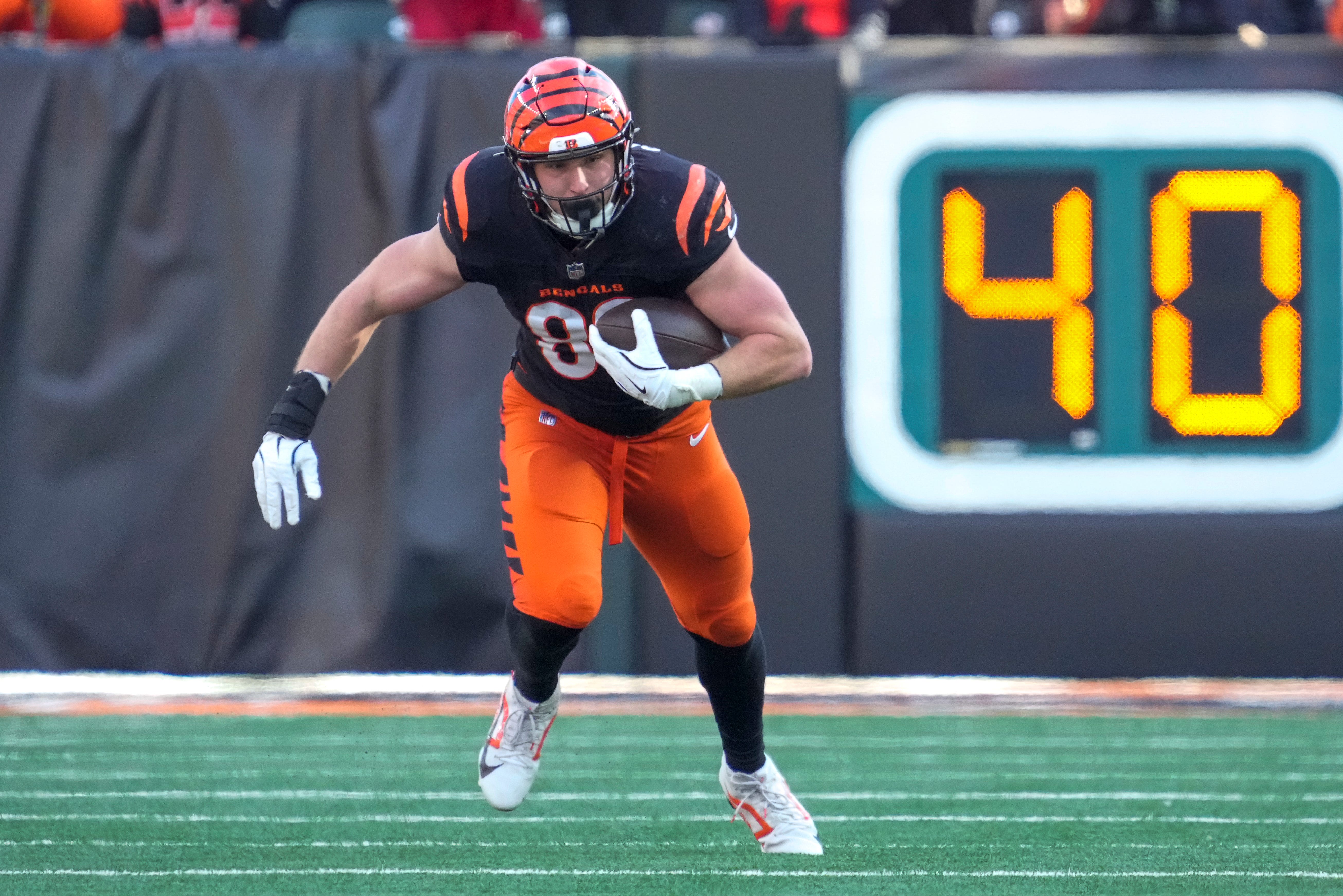 Cincinnati Bengals tight end Drew Sample (89) runs with a catch in the second quarter of the NFL Week 16 game between the Cincinnati Bengals and the Cleveland Browns at Paycor Stadium in downtown Cincinnati on Sunday, Dec. 22, 2024. The Bengals led 17-0 at halftime.