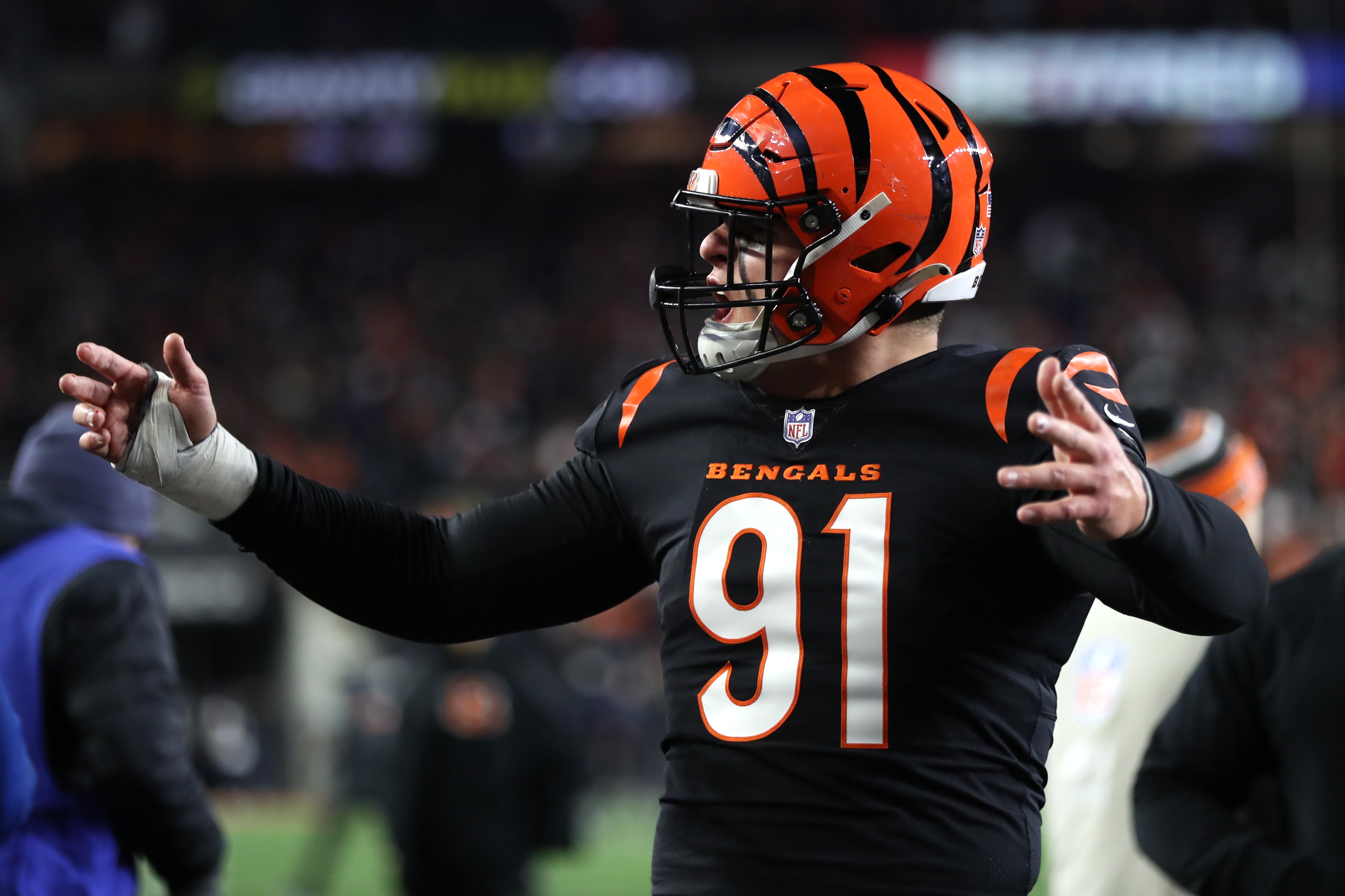 Jan 15, 2023; Cincinnati, Ohio, USA; Cincinnati Bengals defensive end Trey Hendrickson (91) celebrates after defeating the Baltimore Ravens in a wild card game at Paycor Stadium.