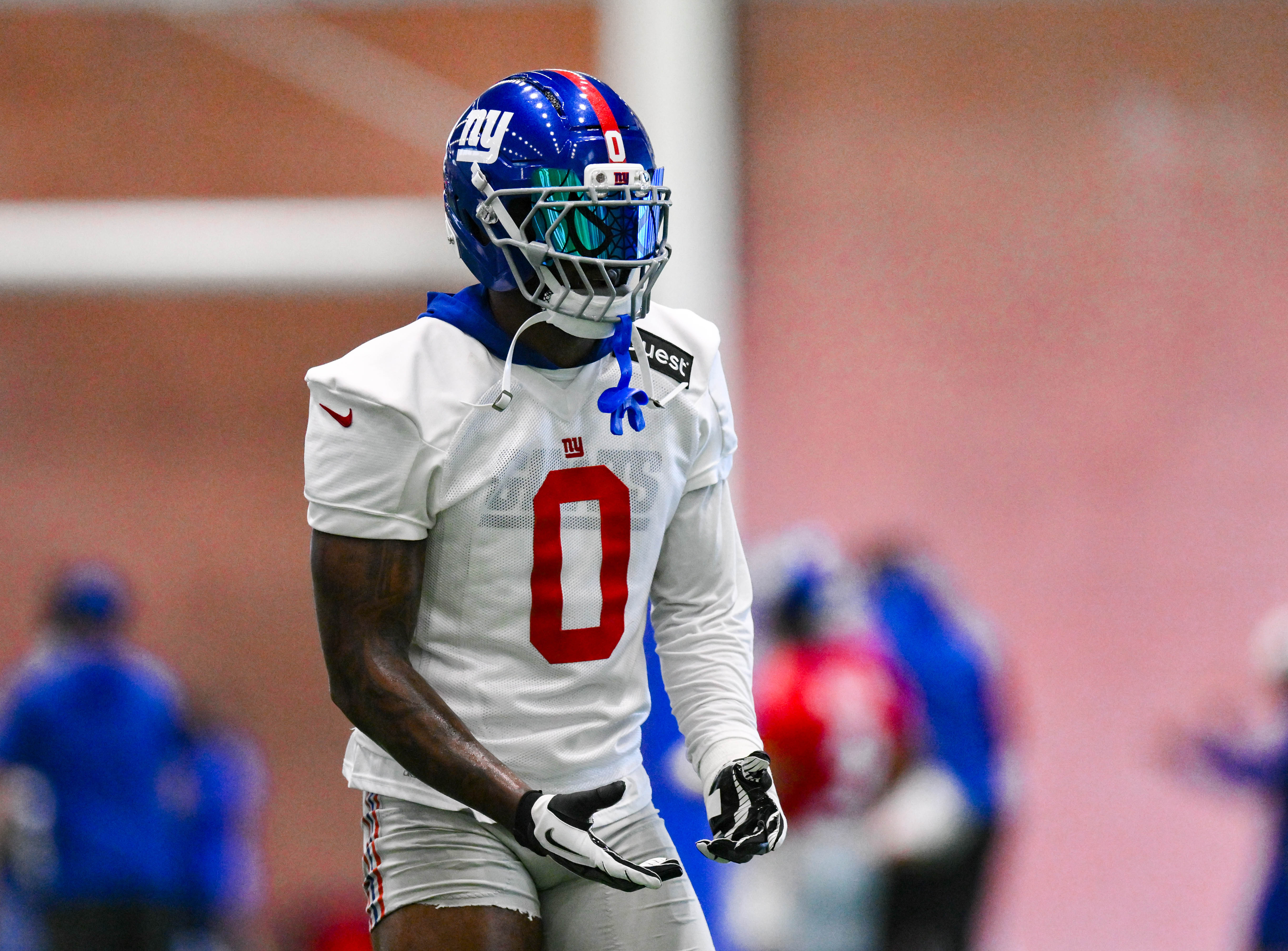 Jun 17, 2025; East Rutherford, NJ, USA; New York Giants linebacker Brian Burns (0) participates in a drill during minicamp at Quest Diagnostics Training Center.