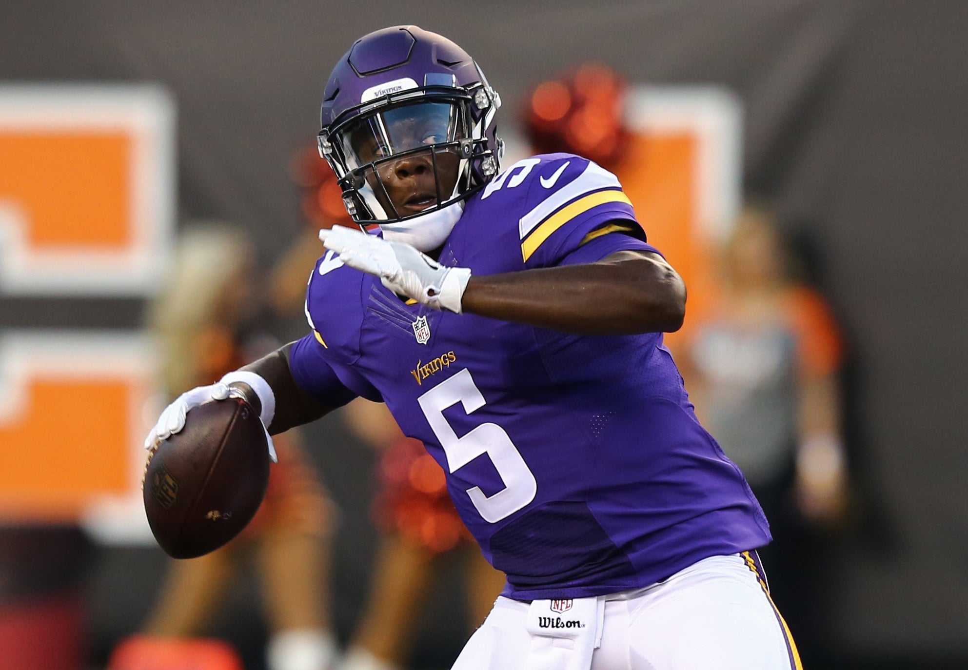 Aug 12, 2016; Cincinnati, OH, USA; Minnesota Vikings quarterback Teddy Bridgewater (5) throws a pass for a touchdown to wide receiver Charles Johnson (not pictured) in the first half against the Cincinnati Bengals in a preseason NFL football game at Paul Brown Stadium.