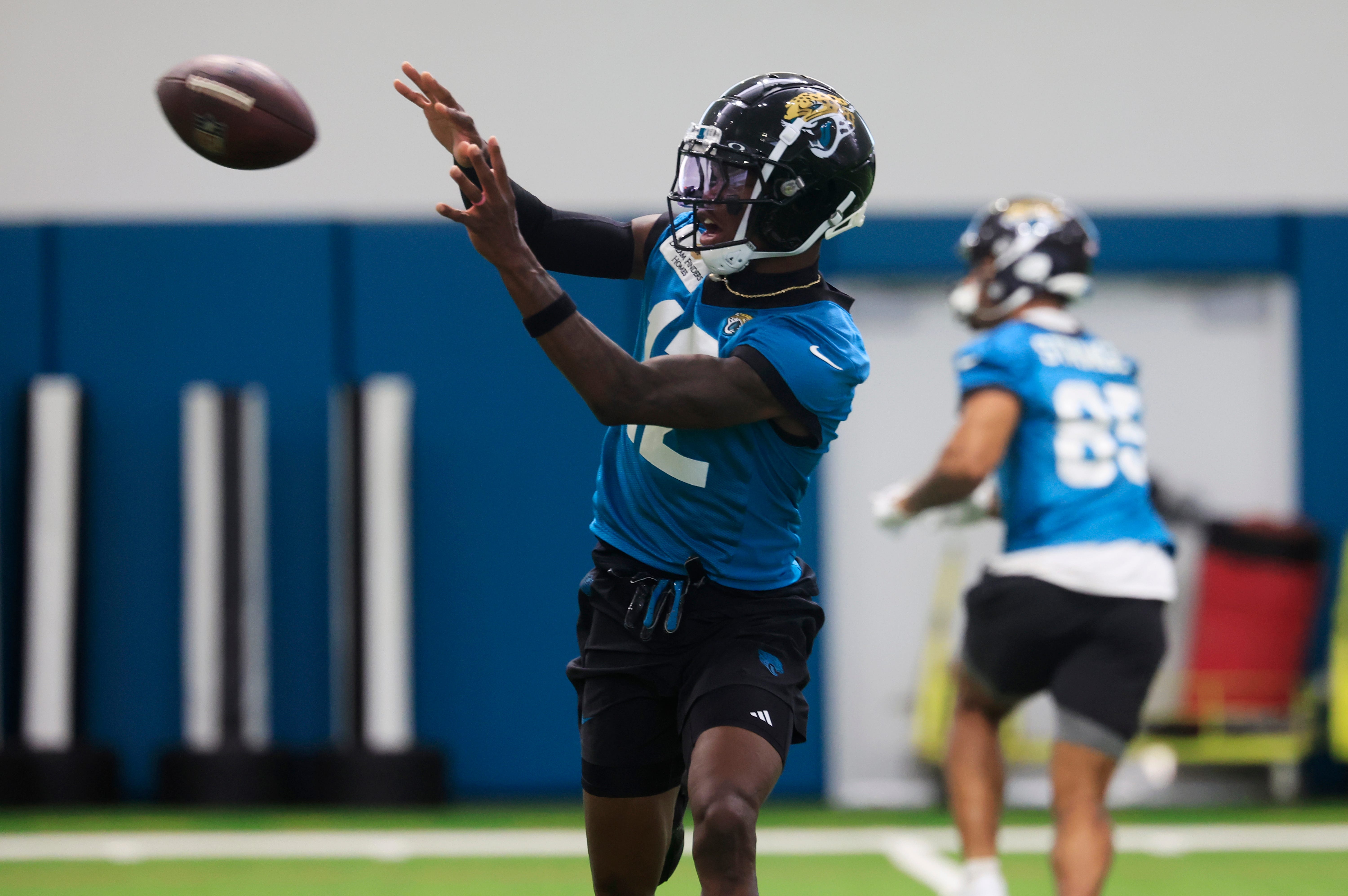 Jacksonville Jaguars wide receiver Travis Hunter (12) catches a pass during the 10th organized team activity at Miller Electric Center Wednesday, June 4, 2025 in Jacksonville, Fla.