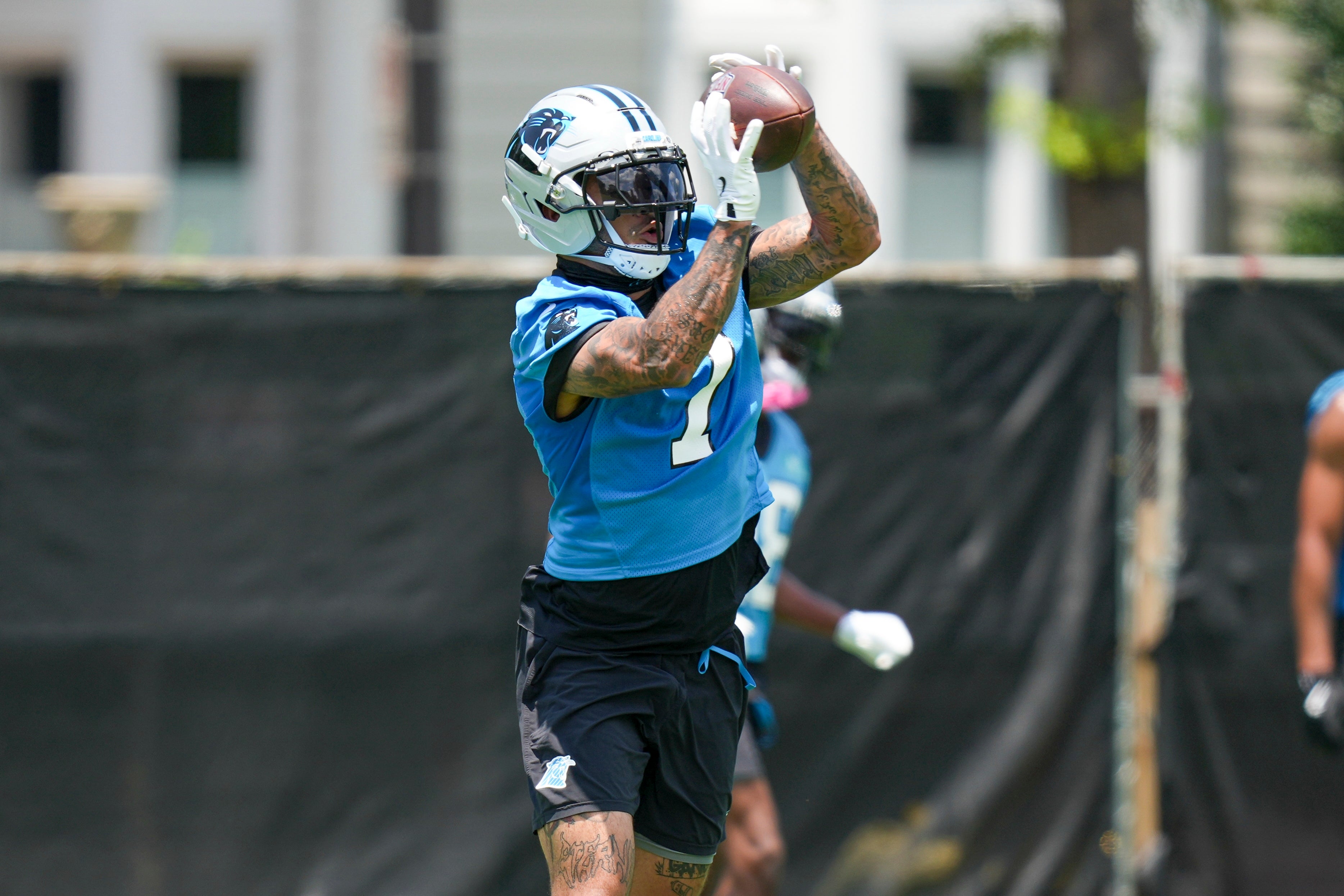 Jun 11, 2025; Charlotte, NC, USA; Carolina Panthers safety Tre'von Moehrig (7) makes a catch during minicamp at Bank of America Stadium.