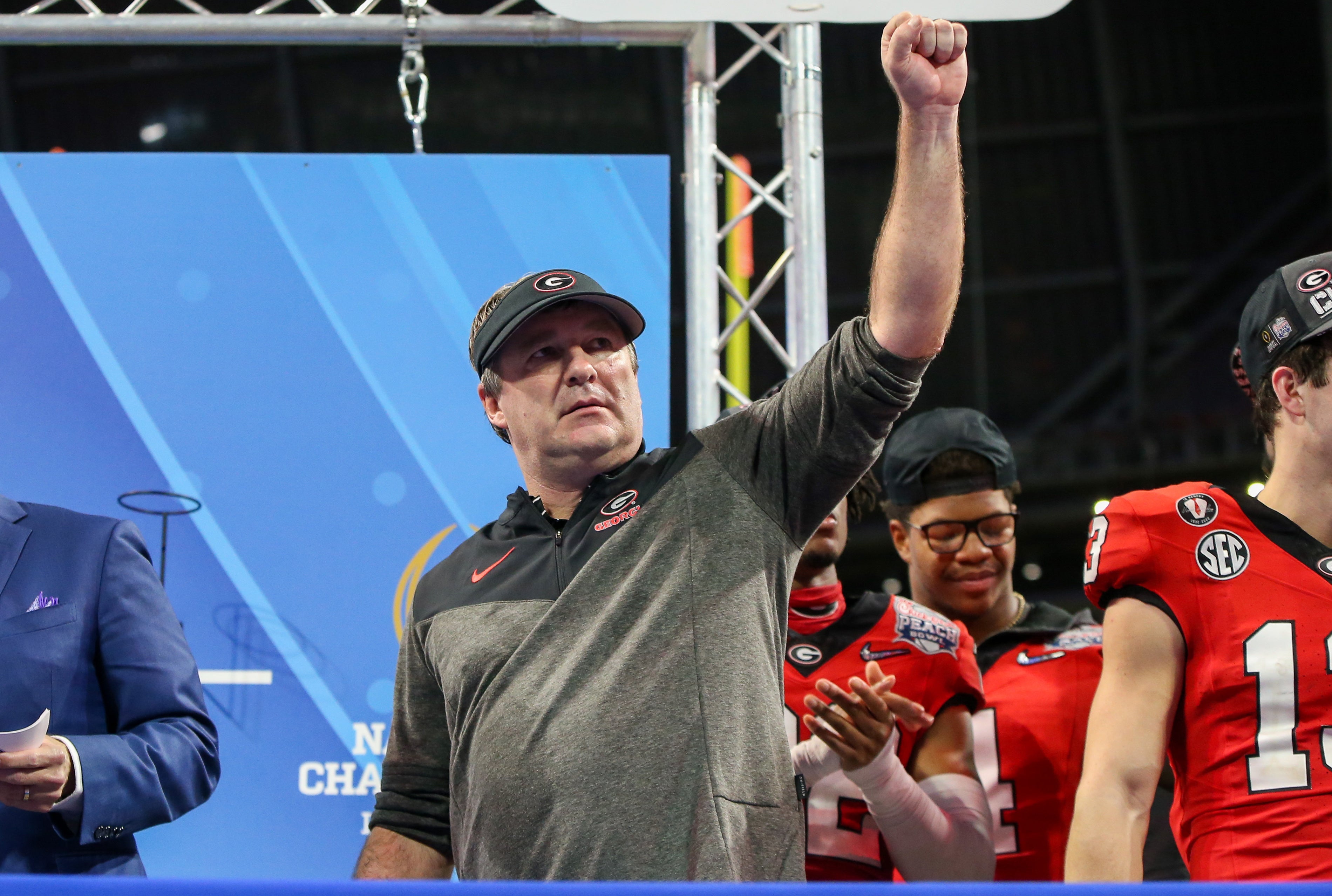 Georgia Bulldogs head coach Kirby Smart celebrates after a victory against the Ohio State Buckeyes in the 2022 Peach Bowl at Mercedes-Benz Stadium.