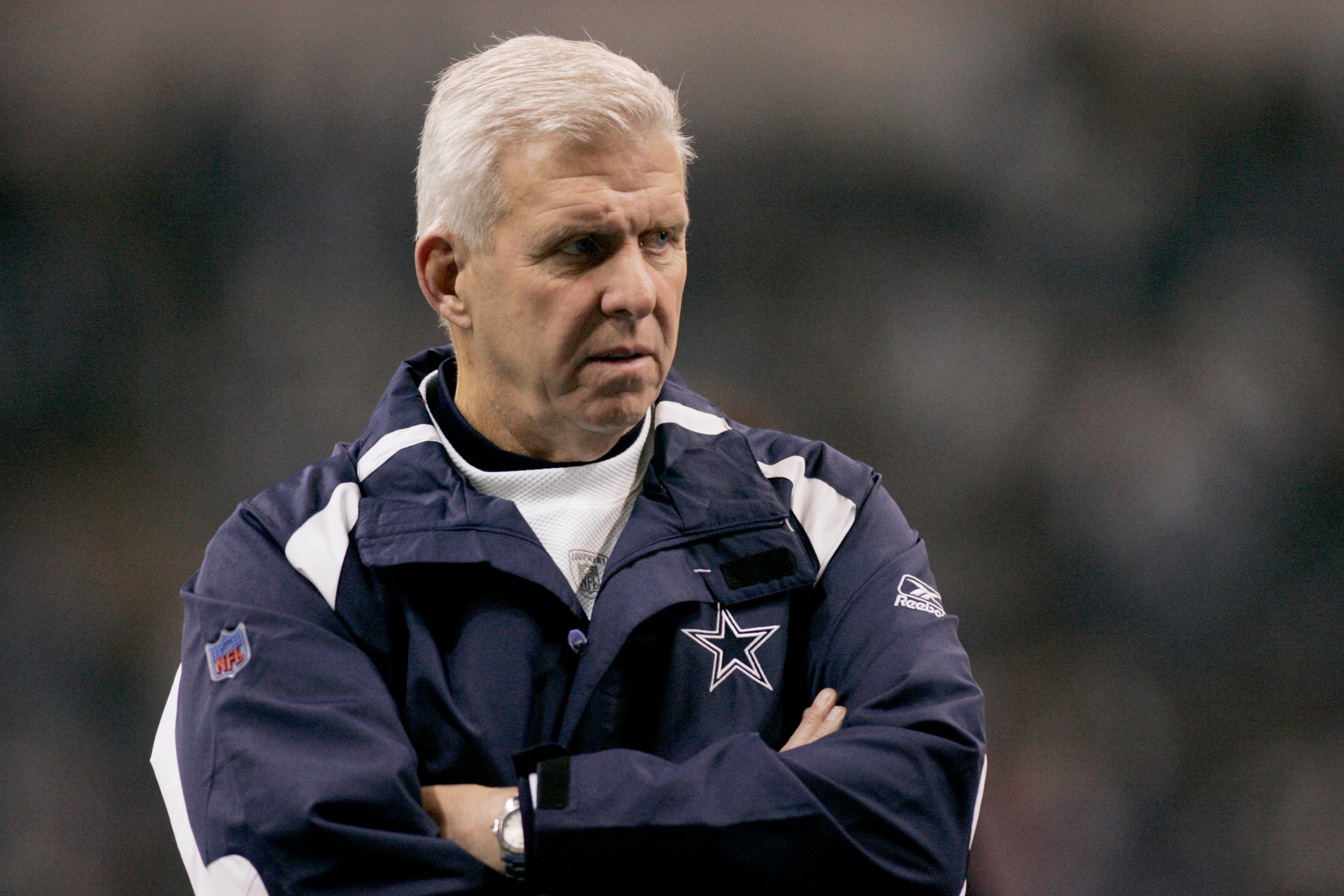 Dallas Cowboys head coach Bill Parcells watches his team warmup before the game against the New Orleans Saints at Texas Stadium.