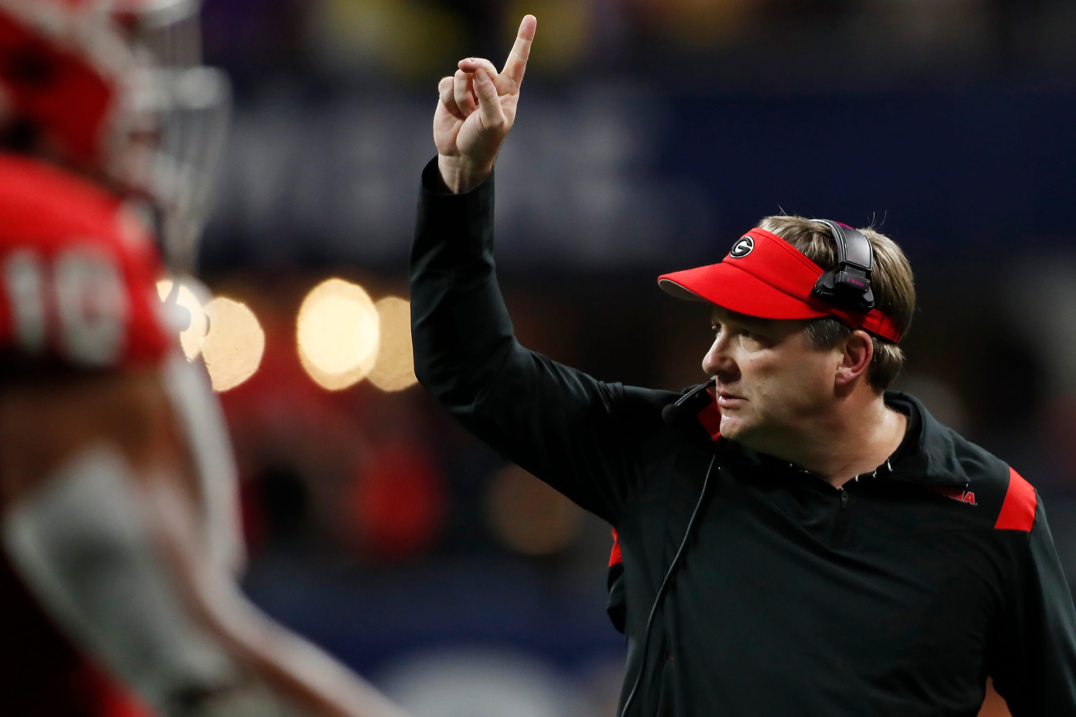 Georgia coach Kirby Smart reacts after the Bulldogs' first touchdown during the first half of the SEC Championship Game against LSU in Atlanta on Dec. 3, 2022. Syndication Online Athens.