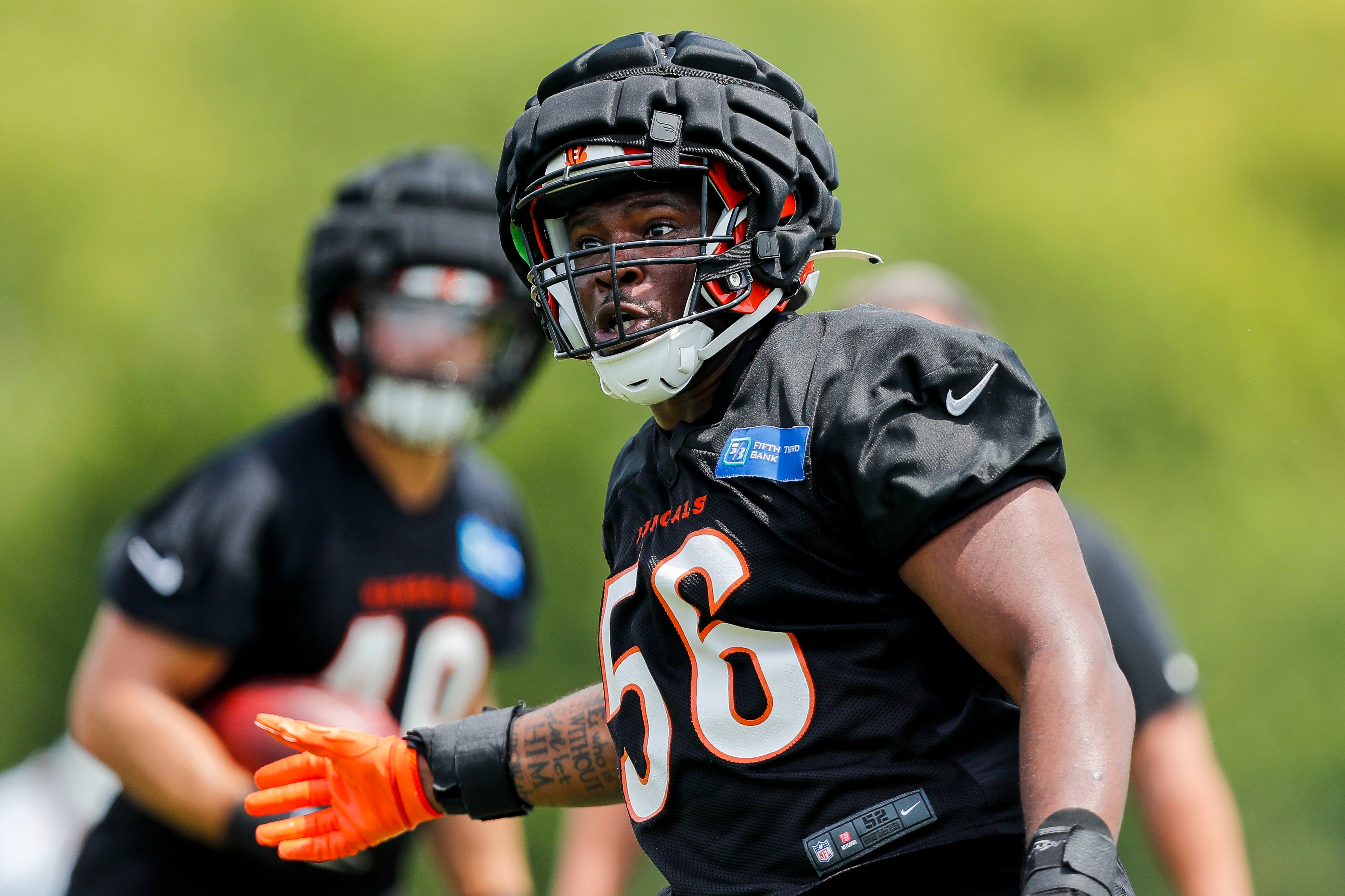 Jul 26, 2023; Cincinnati, OH, USA; Cincinnati Bengals defensive end Raymond Johnson III (56) runs drills during training camp at Kettering Health Practice Fields.