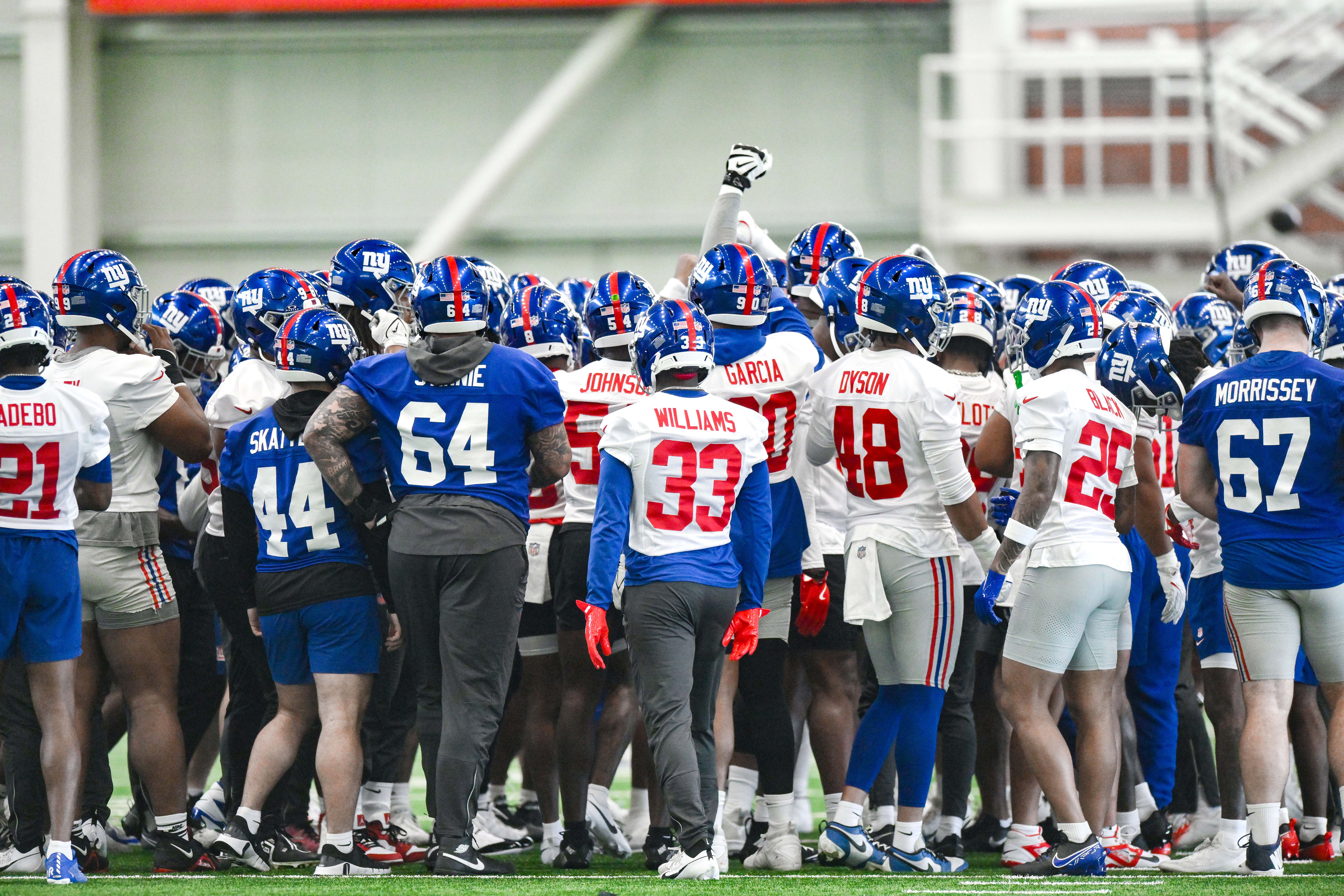 Jun 18, 2025; East Rutherford, NJ, USA; New York Giants huddle during minicamp at Quest Diagnostics Training Center.