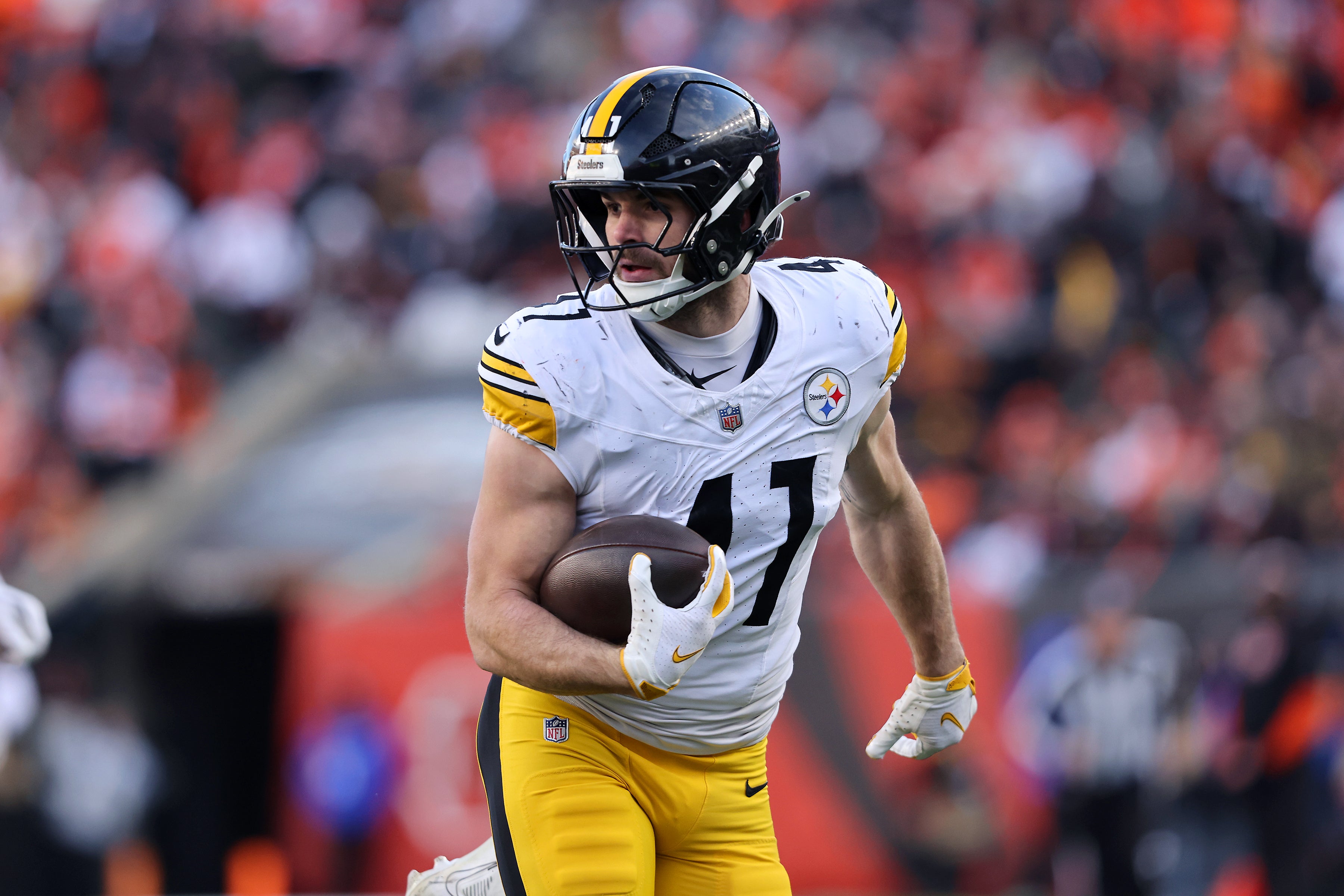 Dec 1, 2024; Cincinnati, Ohio, USA; Pittsburgh Steelers linebacker Payton Wilson (41) picks up the fumble en route to scoring a defensive touchdown during the fourth quarter against the Cincinnati Bengals at Paycor Stadium.