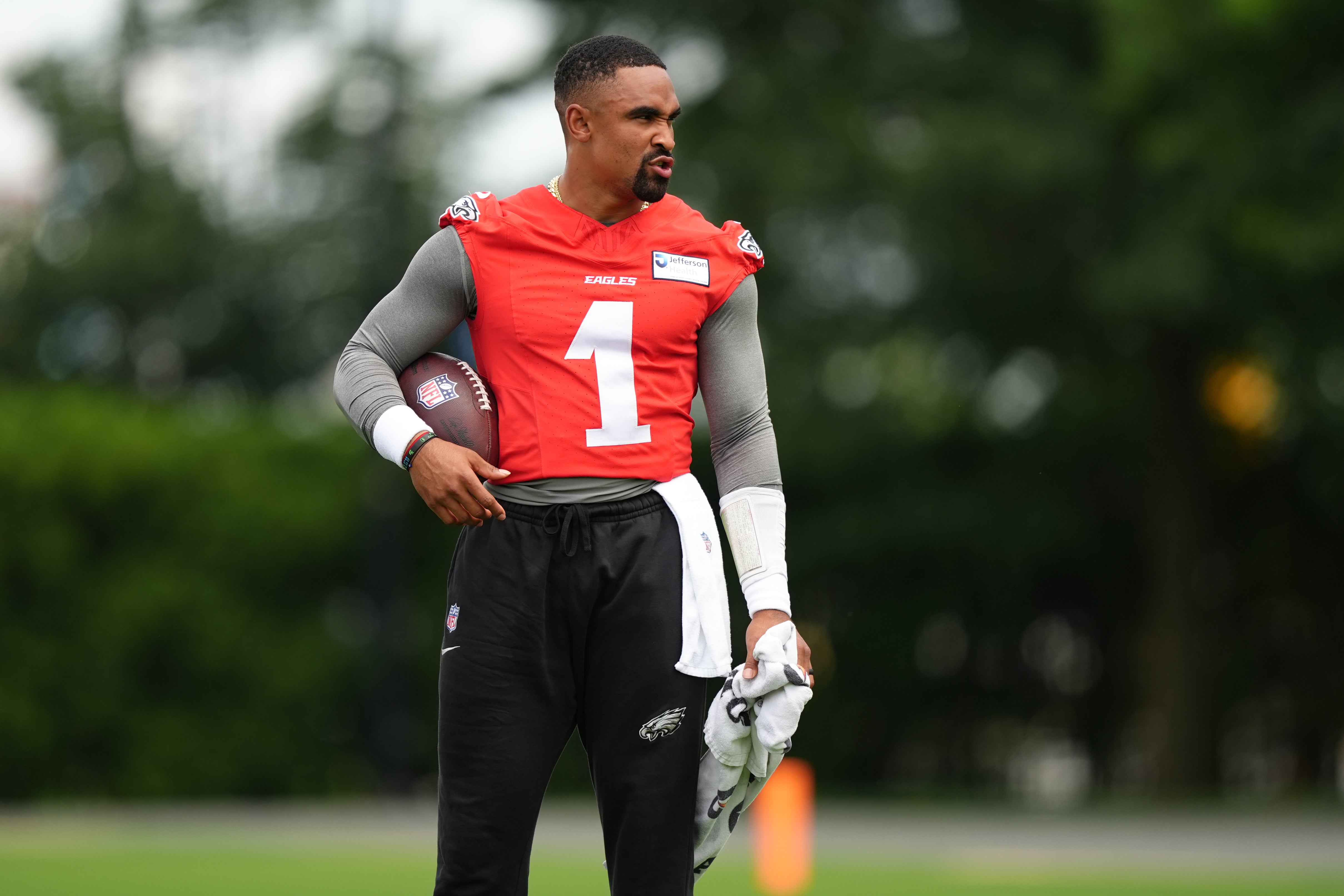 Philadelphia Eagles quarterback Jalen Hurts (1) looks on during a practice drill at NovaCare Complex.