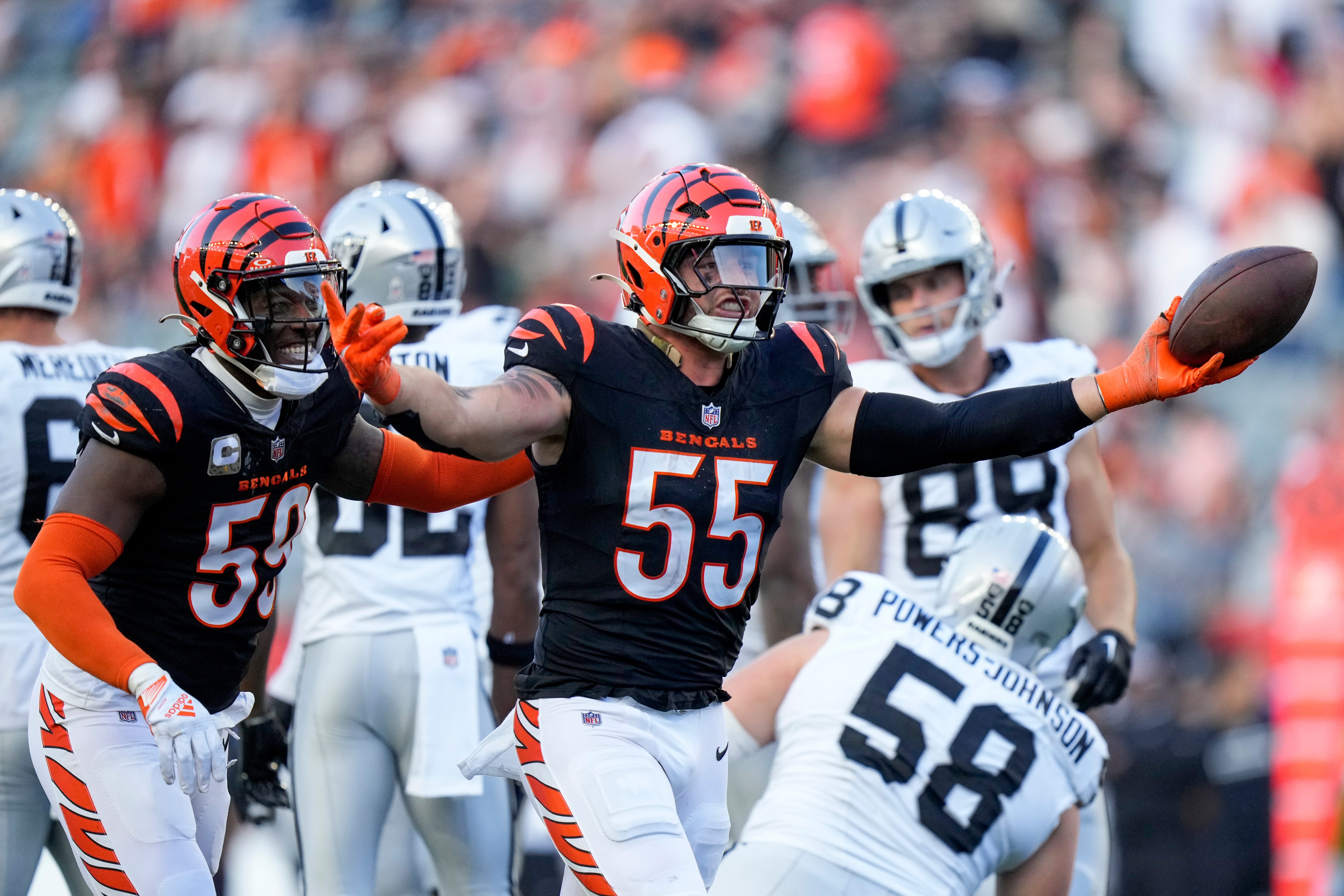 Cincinnati Bengals linebacker Logan Wilson (55) celebrates after recovering a fumble in the fourth quarter of the NFL Week 9 game between the Cincinnati Bengals and the Las Vegas Raiders at Paycor Stadium in downtown Cincinnati on Sunday, Nov. 3, 2024. The Bengals collected their first win at home with a 41-24 victory over the Raiders.