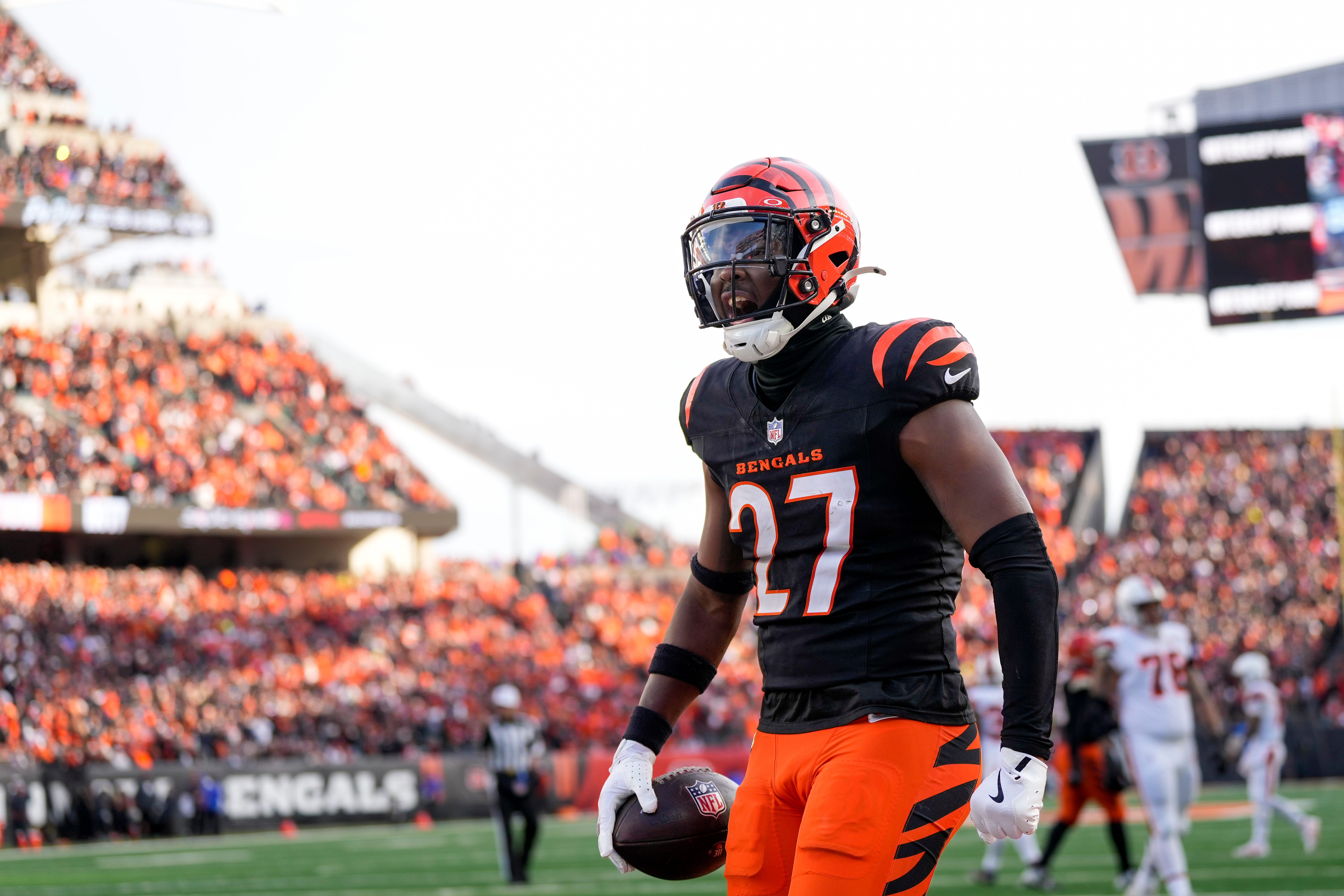 Cincinnati Bengals safety Jordan Battle (27) celebrates after intercepting a pass in the end zone intended for Cleveland Browns tight end David Njoku (85) in the fourth quarter of the NFL Week 16 game between the Cincinnati Bengals and the Cleveland Browns at Paycor Stadium in downtown Cincinnati on Sunday, Dec. 22, 2024. The Bengals won 24-16.