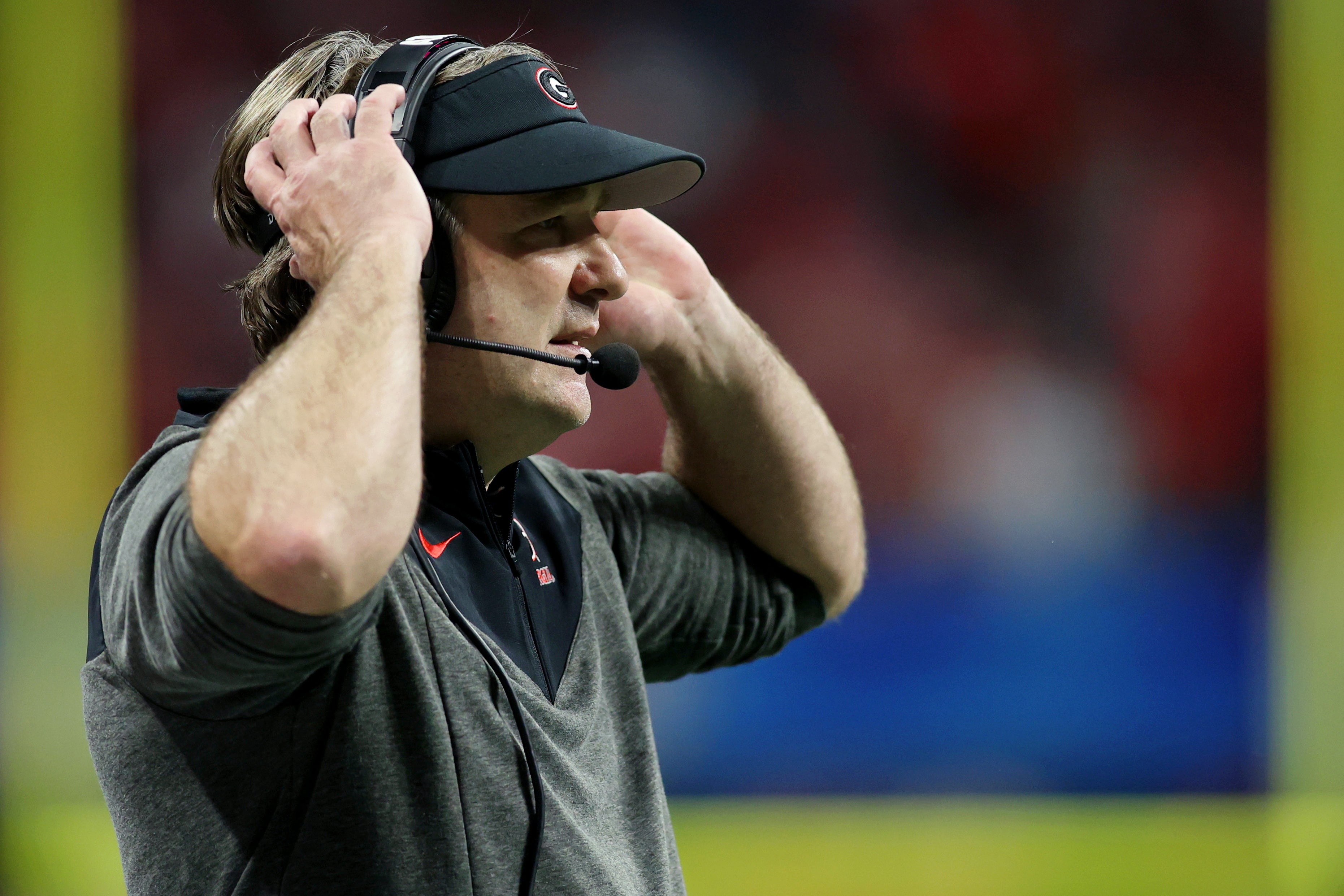 Georgia Bulldogs head coach Kirby Smart looks on against the Ohio State Buckeyes during the third quarter of the 2022 Peach Bowl at Mercedes-Benz Stadium.