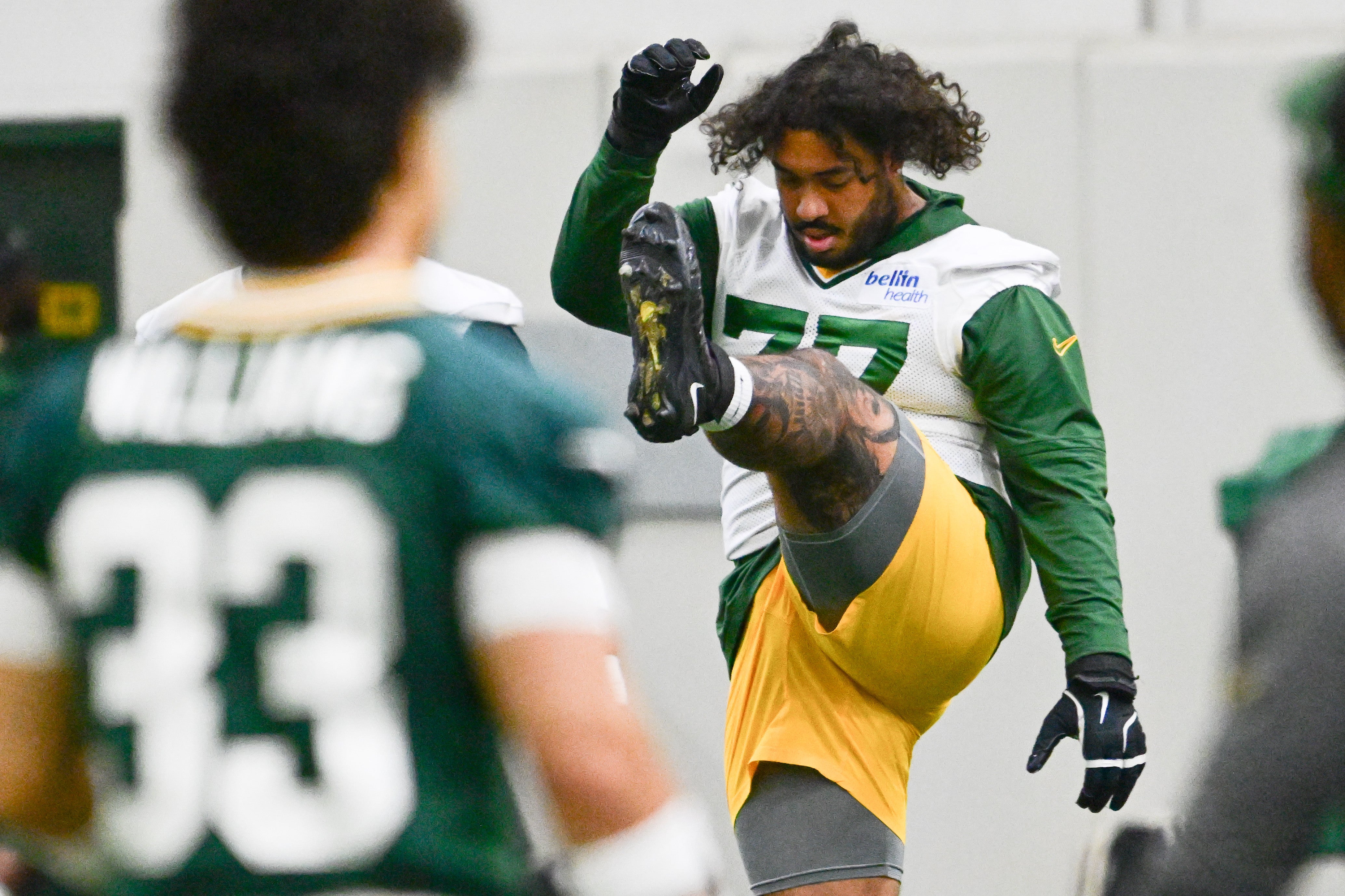 Green Bay Packers offensive tackle Jordan Morgan (77) participates in the team's minicamp at Ray Nitschke Field.