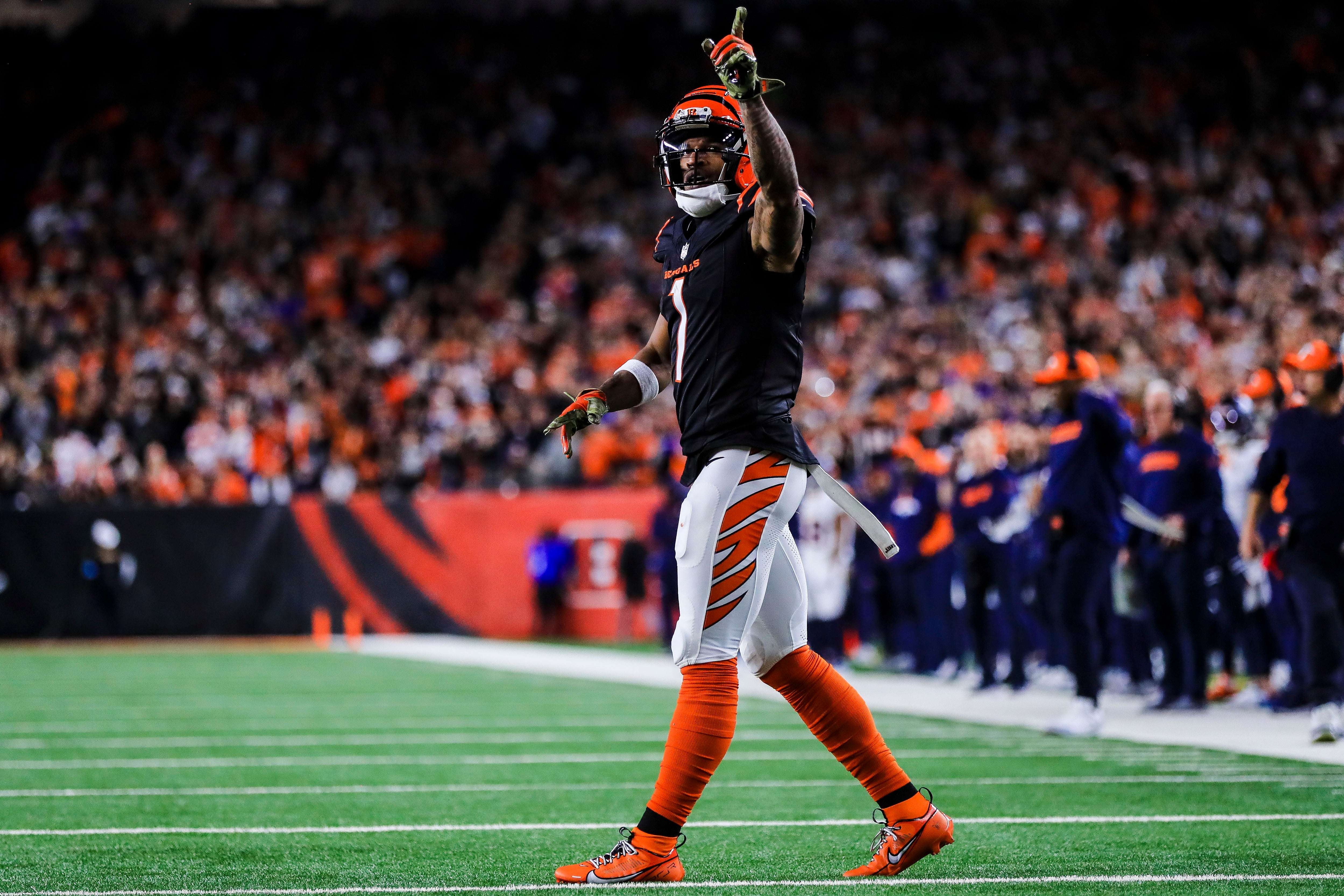Dec 28, 2024; Cincinnati, Ohio, USA; Cincinnati Bengals wide receiver Ja'Marr Chase (1) reacts after a play against the Denver Broncos in the second half at Paycor Stadium.