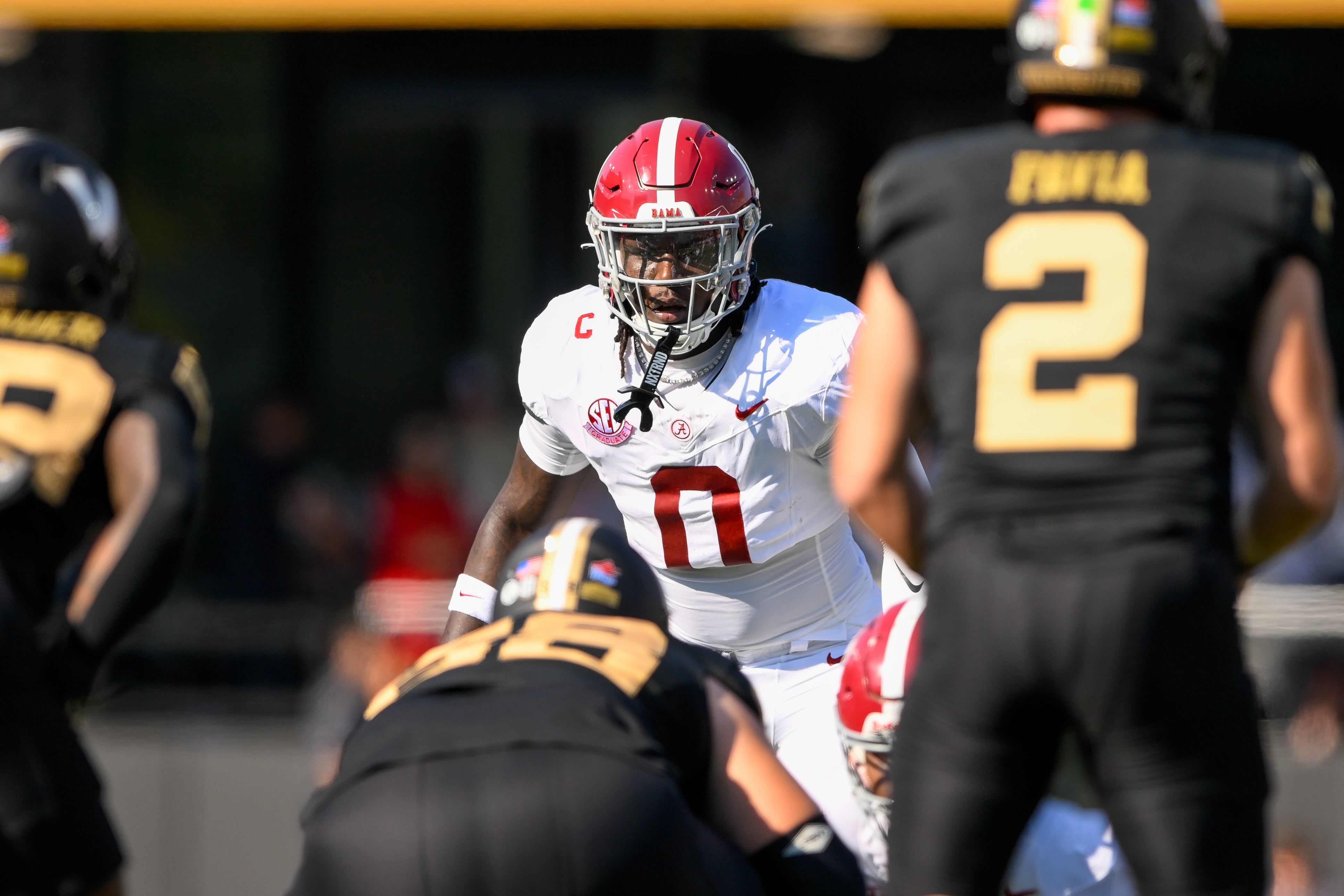 Oct 5, 2024; Nashville, Tennessee, USA; Alabama Crimson Tide linebacker Deontae Lawson (0) sneaks a peek into the backfield against the Vanderbilt Commodores during the first half at FirstBank Stadium. Mandatory Credit: Steve Roberts-Imagn Images
