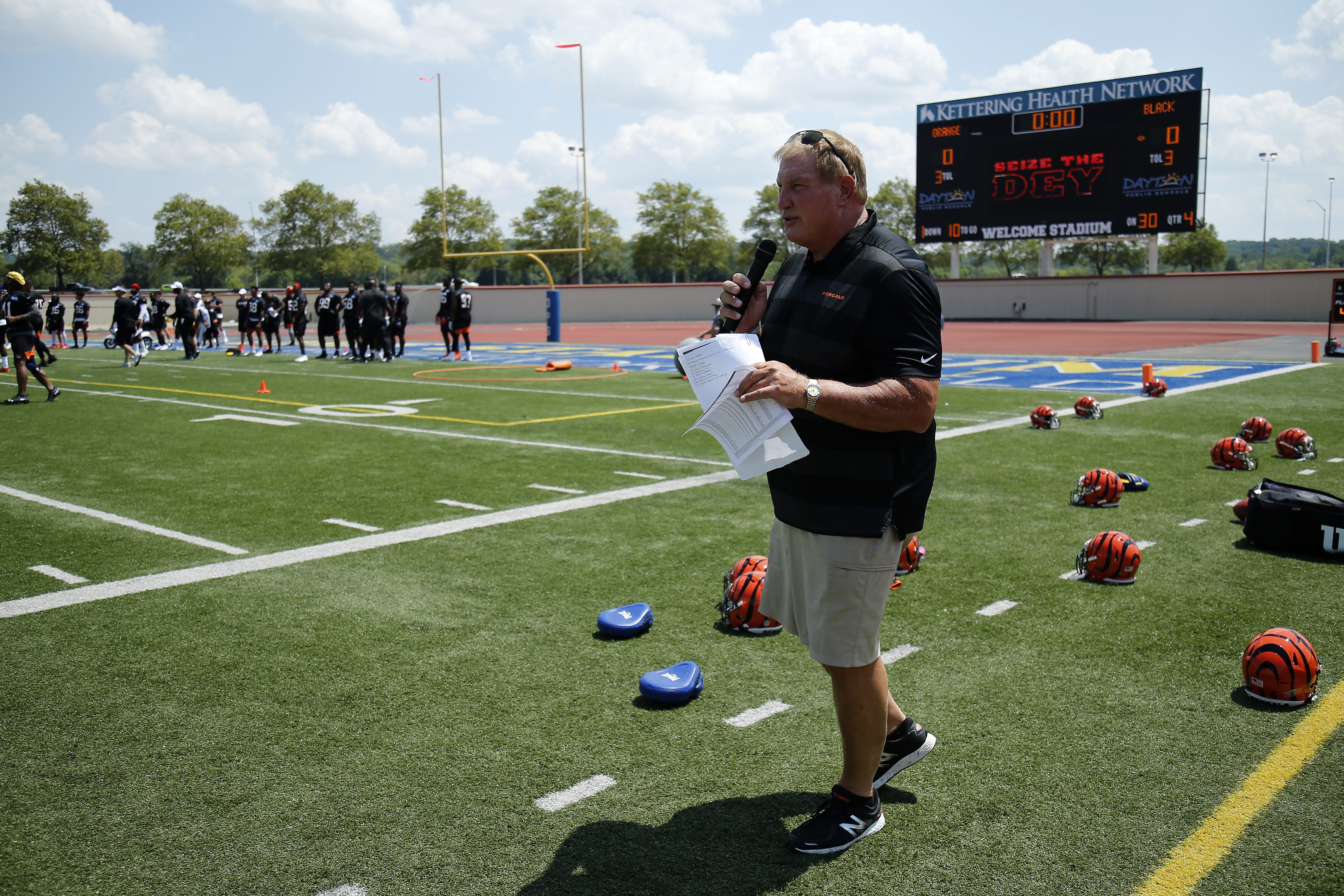 Bengals broadcaster Dave Lapham hosts the day's events during the opening day of training camp at Welcome Stadium in Dayton, Ohio, on Saturday, July 27, 2019. Bengals Training Camp.