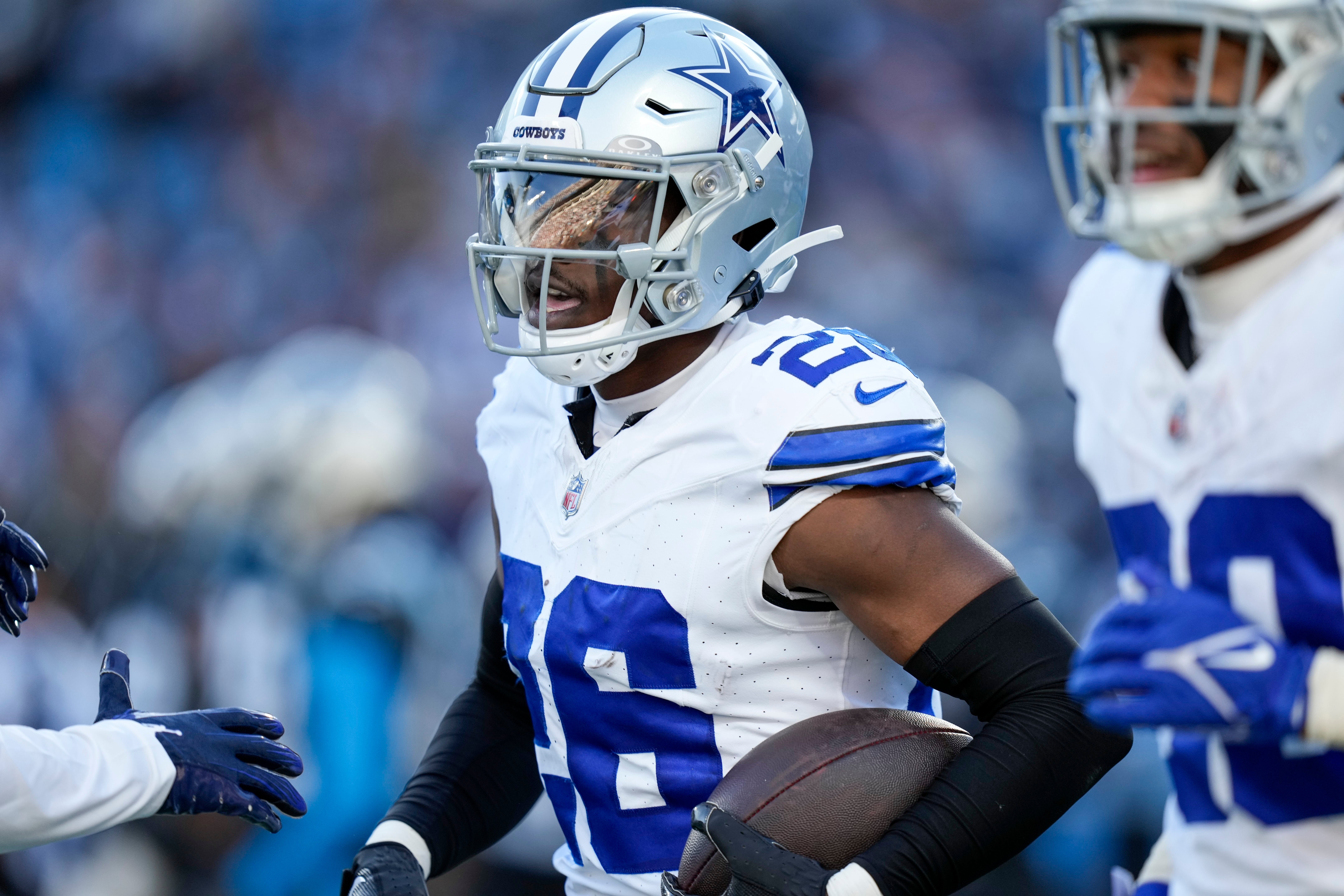 Dallas Cowboys cornerback DaRon Bland (26) celebrates his score against the Carolina Panthers during the second half at Bank of America Stadium.
