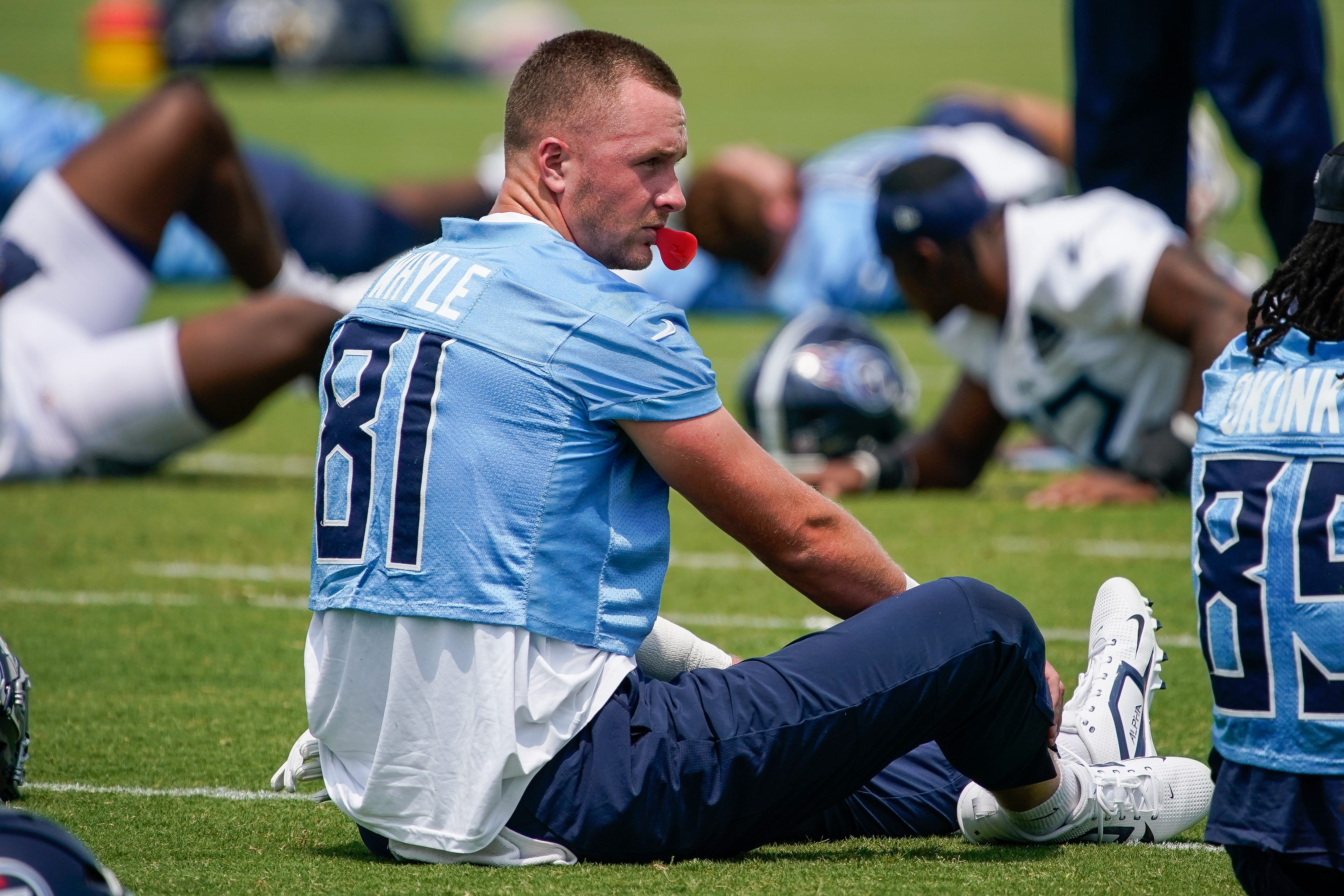Tennessee Titans tight end Josh Whyle (81) stretches during minicamp practice at Ascension Saint Thomas Sports Park in Nashville, Tenn., Wednesday, June 11, 2025.