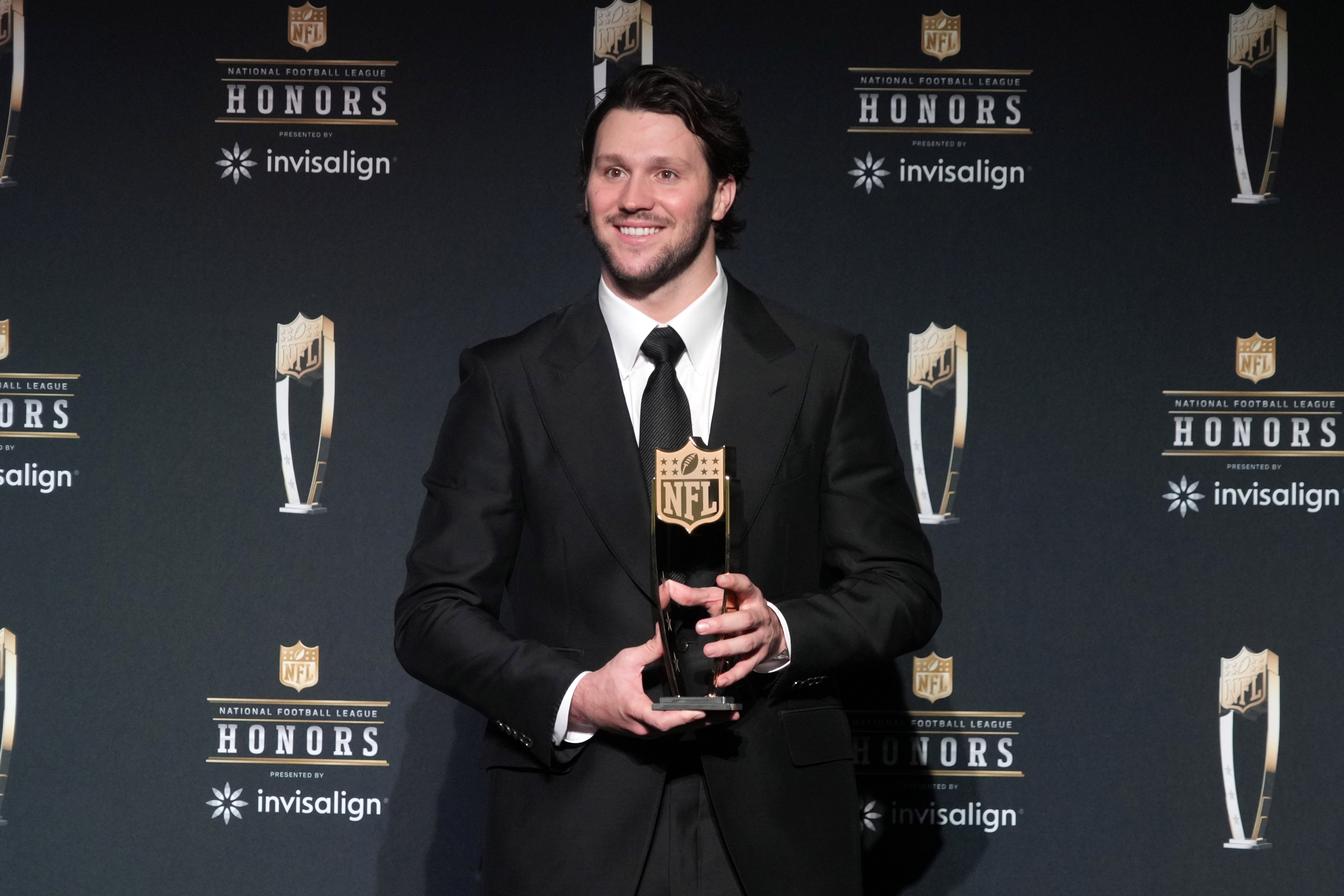 Feb 6, 2025; New Orleans, LA, USA; Buffalo Bills quarterback Josh Allen poses wtih the Most Valuable Player award during Super Bowl LIX NFL Honors at Saenger Theatre.