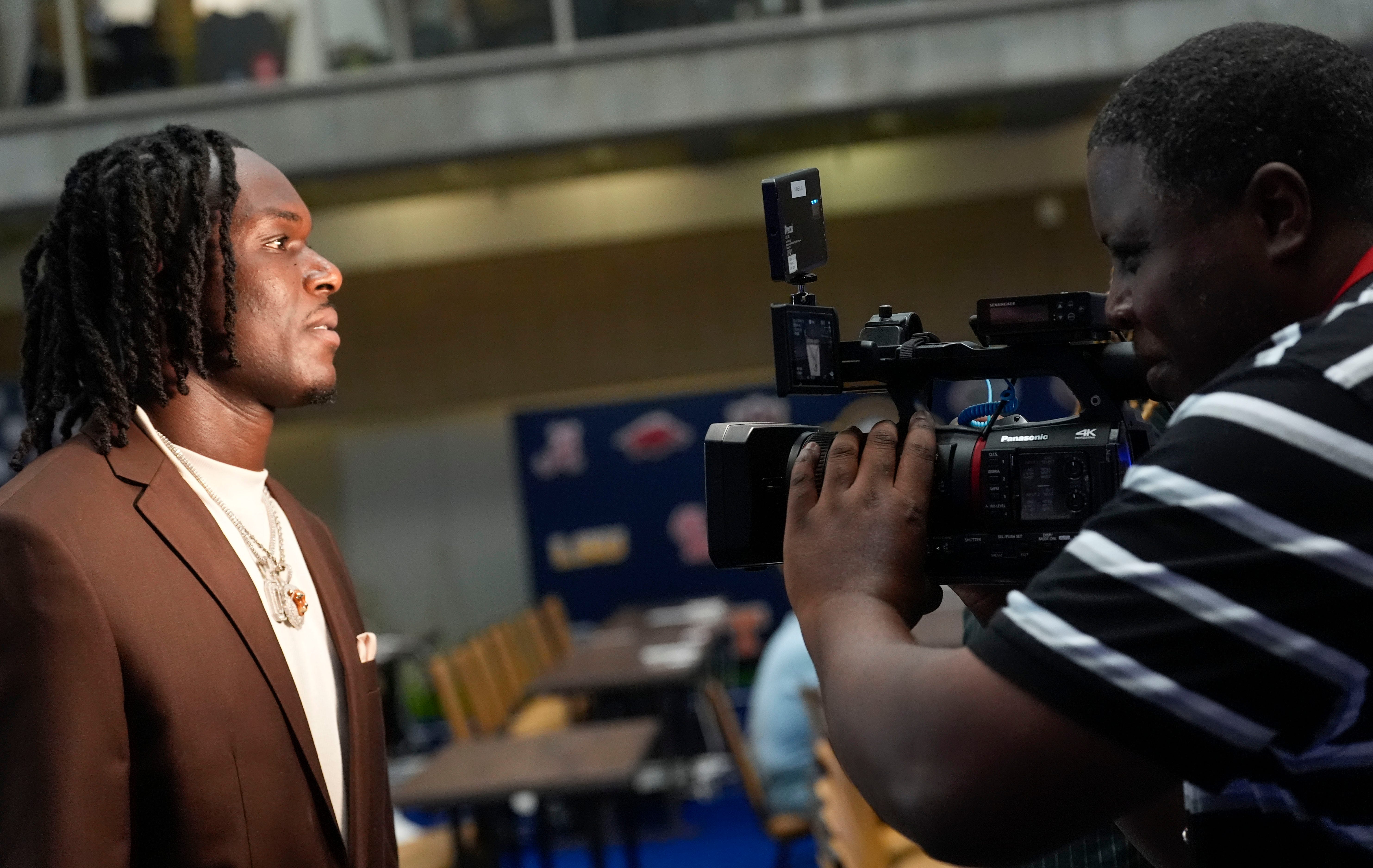 July 16, 2025; Atlanta, GA, USA; Ron Gaines takes video of Deontae Lawson during SEC Media Days at the College Football Hall of Fame in Atlanta.