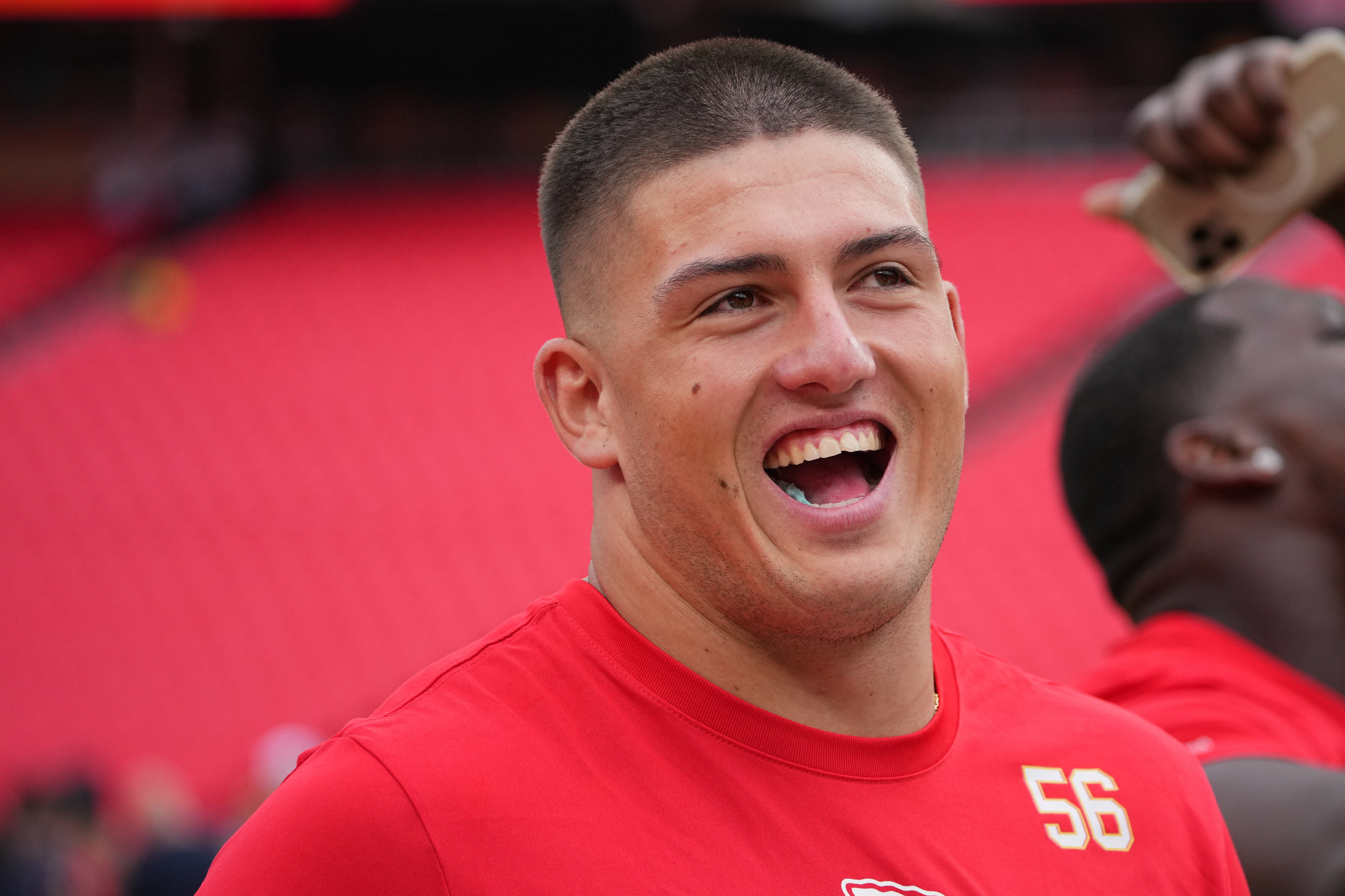 Aug 22, 2024; Kansas City, Missouri, USA; Kansas City Chiefs defensive end George Karlaftis (56) warms up against the Chicago Bears prior to a game at GEHA Field at Arrowhead Stadium.