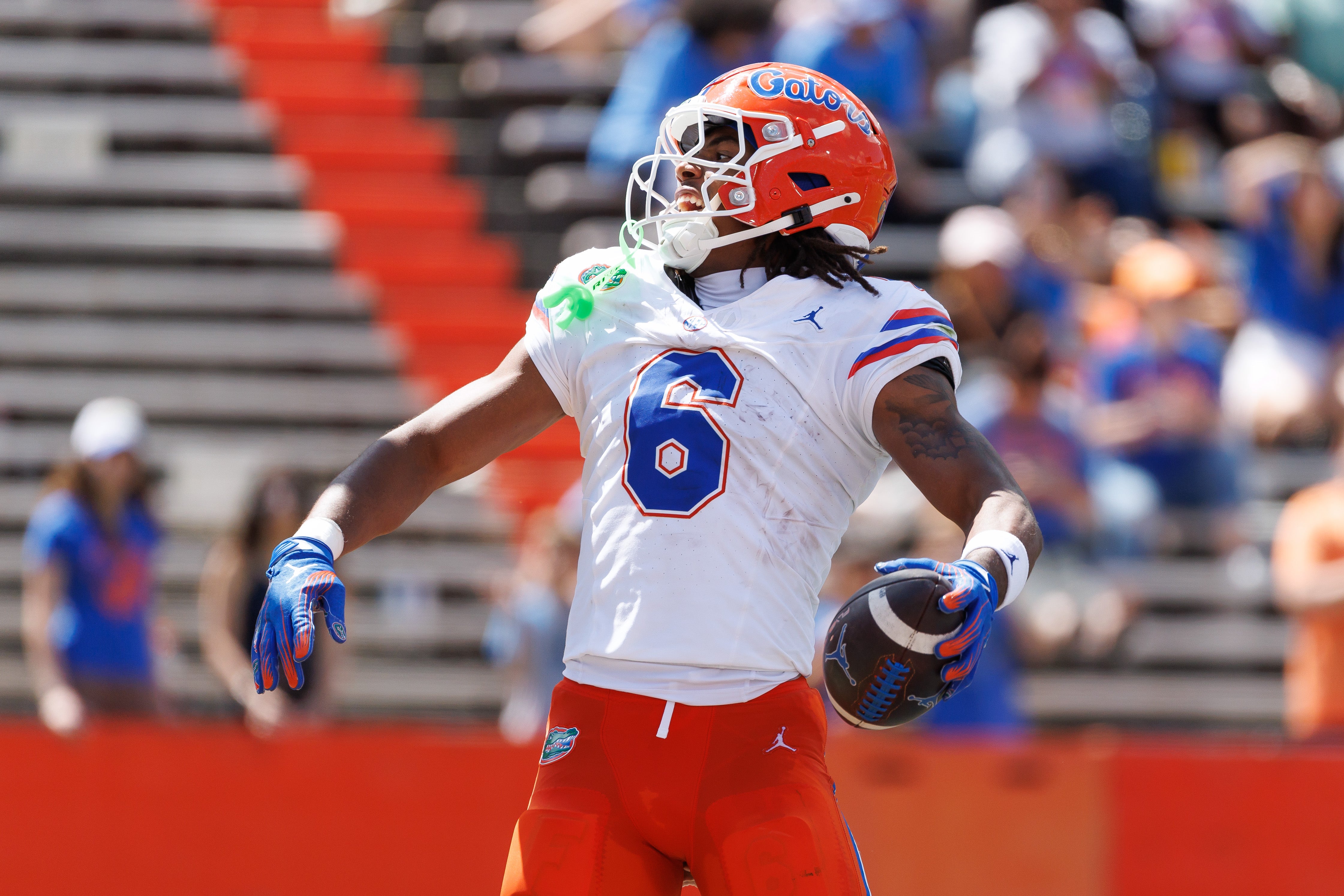 Apr 12, 2025; Gainesville, FL, USA; Florida Gators wide receiver Dallas Wilson (6) reacts after scoring a touchdown during the second half at Ben Hill Griffin Stadium.
