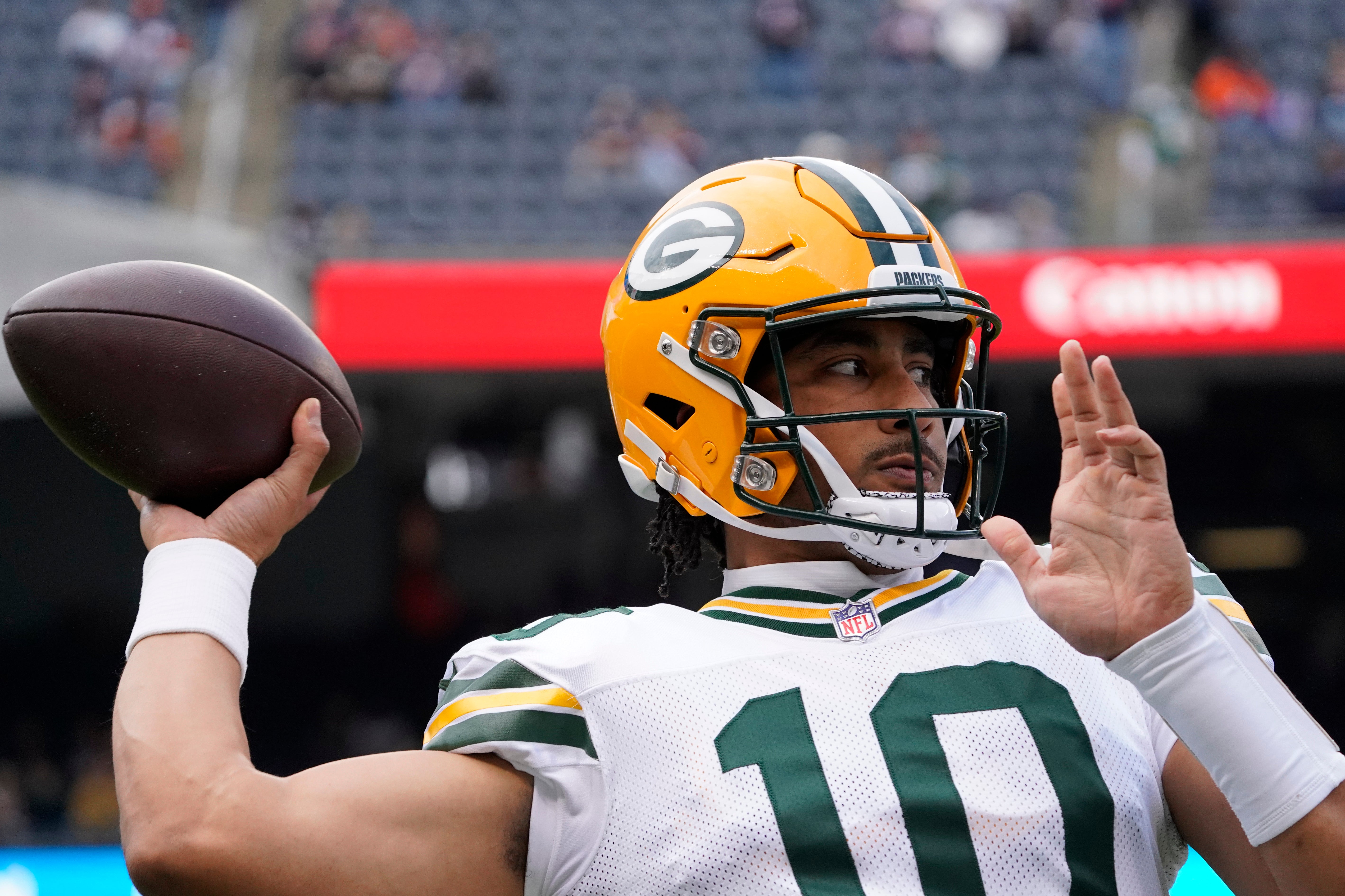 Green Bay Packers quarterback Jordan Love (10) warms up before the game against the Chicago Bears at Soldier Field.