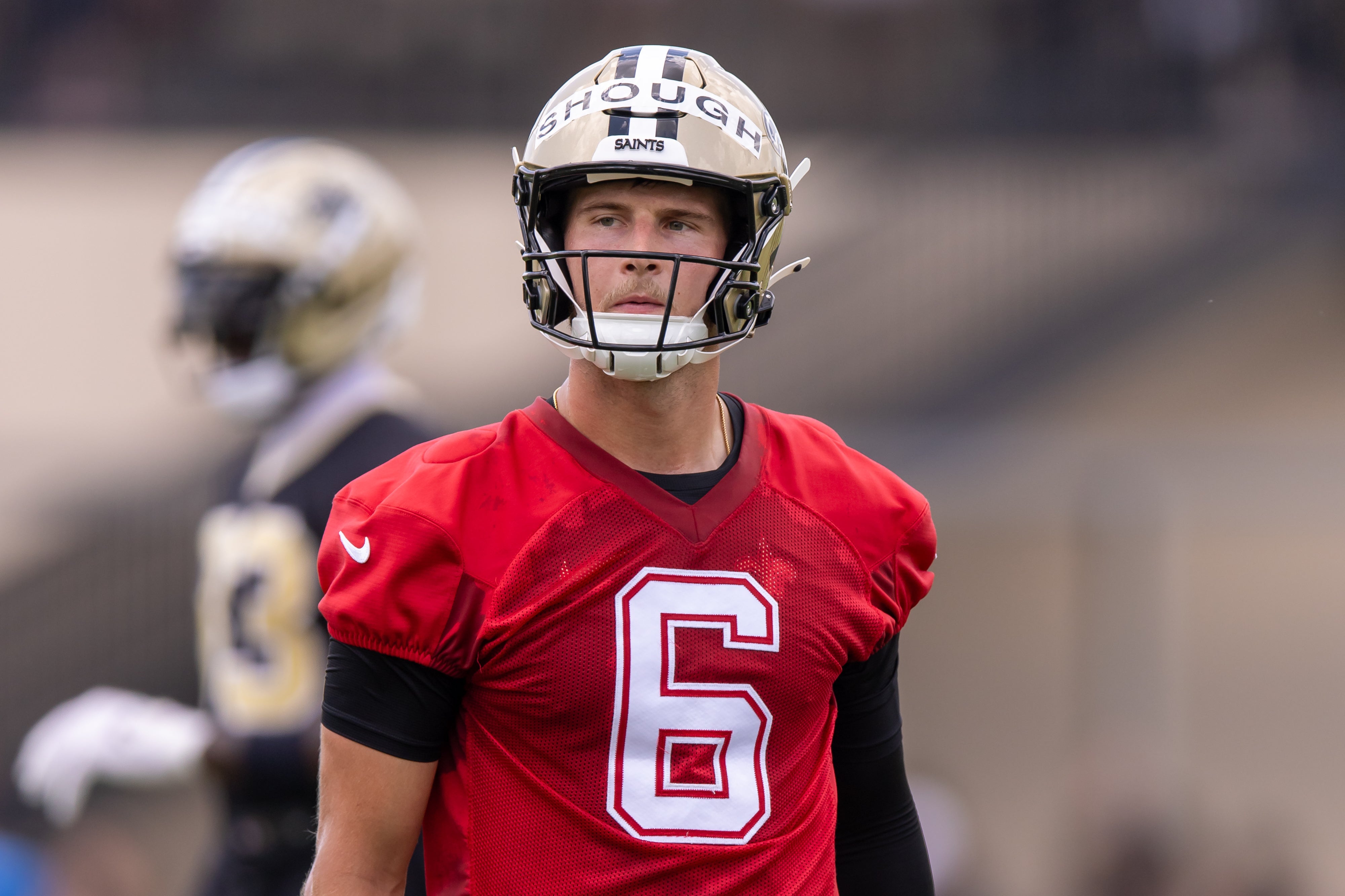 Jun 10, 2025; New Orleans, LA, USA; New Orleans Saints quarterback Tyler Shough (6) looks on during minicamp at Ochsner Sports Performance Center.
