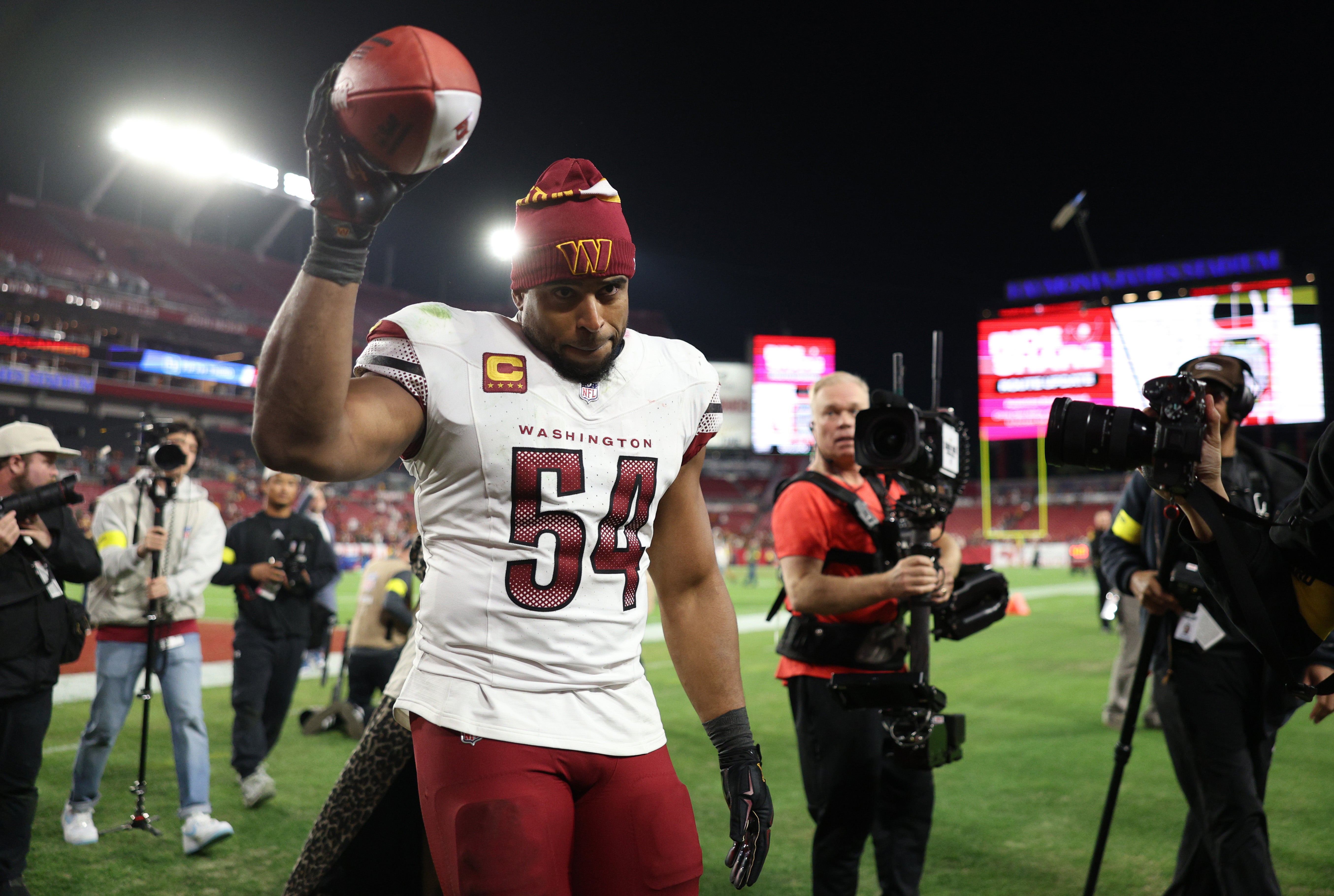 an 12, 2025; Tampa, Florida, USA; Washington Commanders linebacker Bobby Wagner (54) celebrates after winning a NFC wild card playoff against the Tampa Bay Buccaneers at Raymond James Stadium.