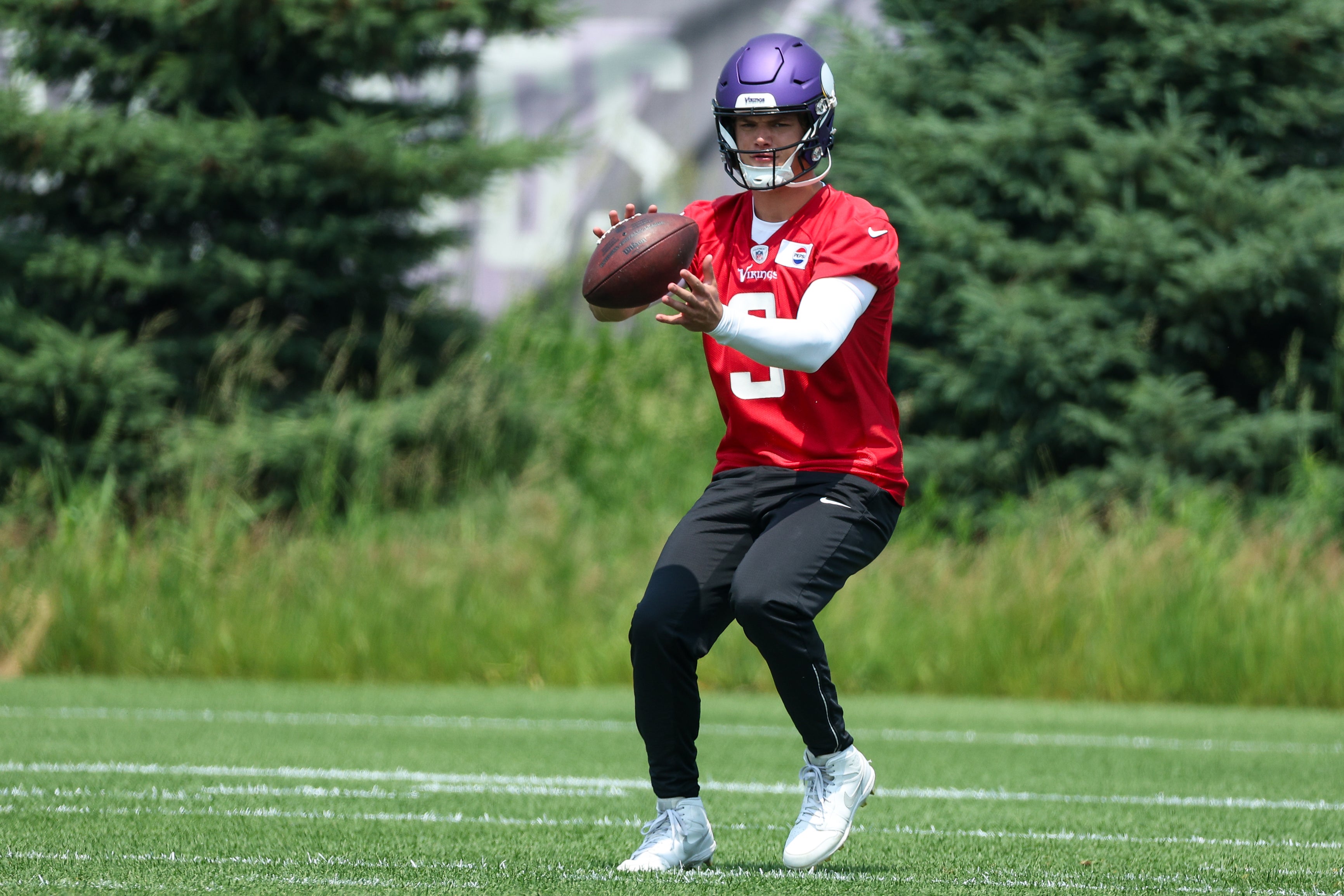 Jun 10, 2025; Minneapolis, MN, USA; Minnesota Vikings quarterback J.J. McCarthy (9) practices during minicamp at the Minnesota Vikings Training Facility.