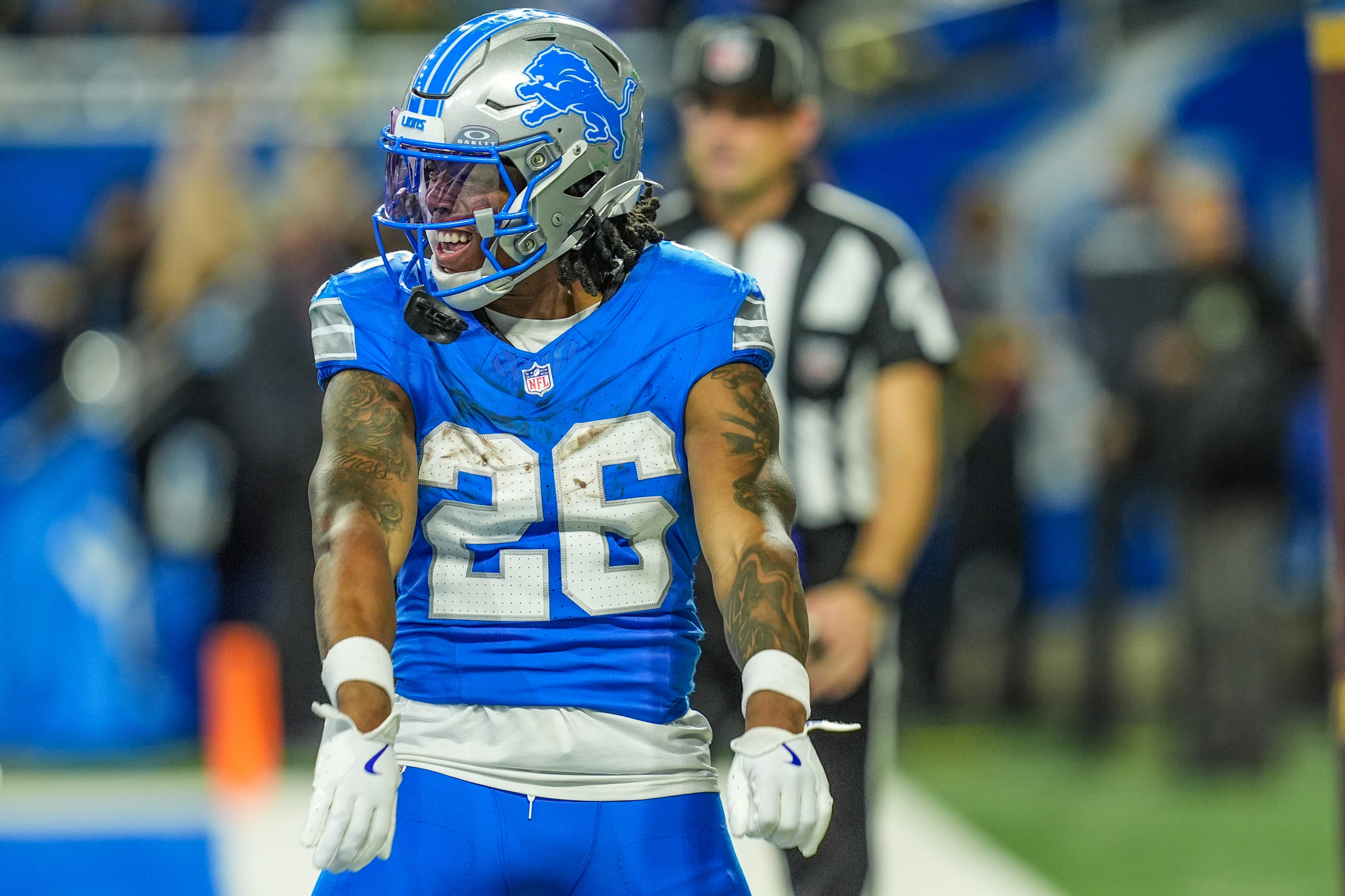 Detroit Lions running back Jahmyr Gibbs (26) celebrates his touchdown in the end zone, during the Thursday Night Football at Ford Field in Detroit on Thursday, Dec. 5, 2024.