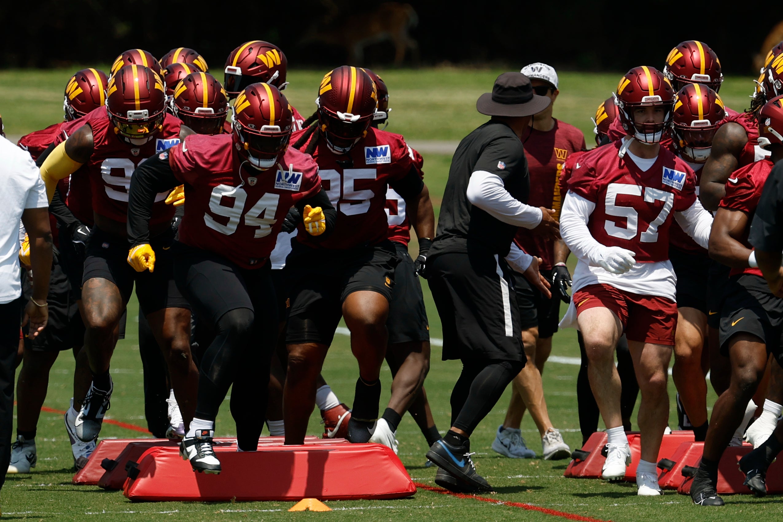 Jun 10, 2025; Ashburn, VA, USA; Washington Commanders players participate in footwork drills on day one of minicamp at Commanders Park.
