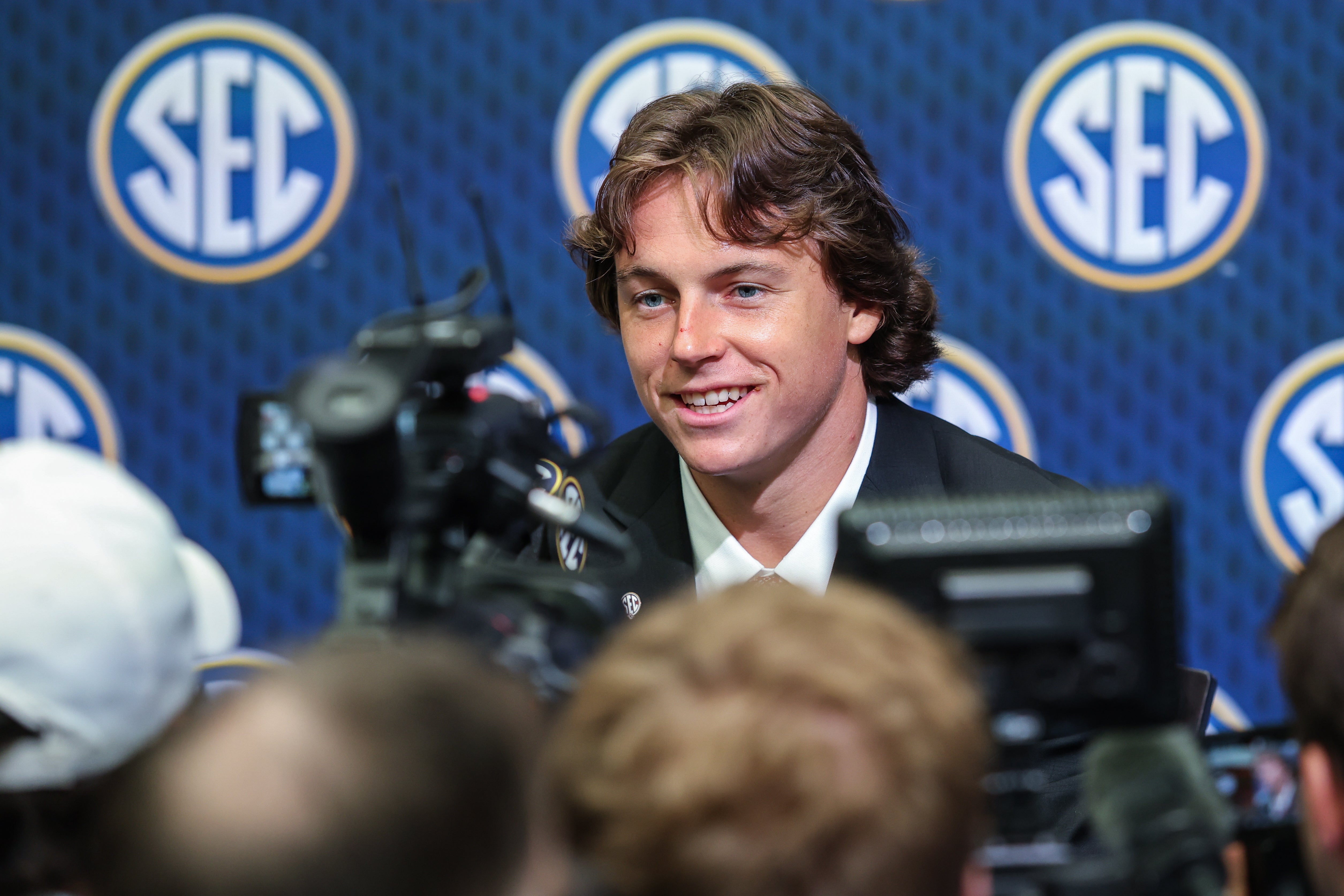 Jul 16, 2025; Atlanta, GA, USA; Oklahoma Sooners quarterback John Mateer answers questions from the media during the SEC Media Days at Omni Atlanta Hotel.