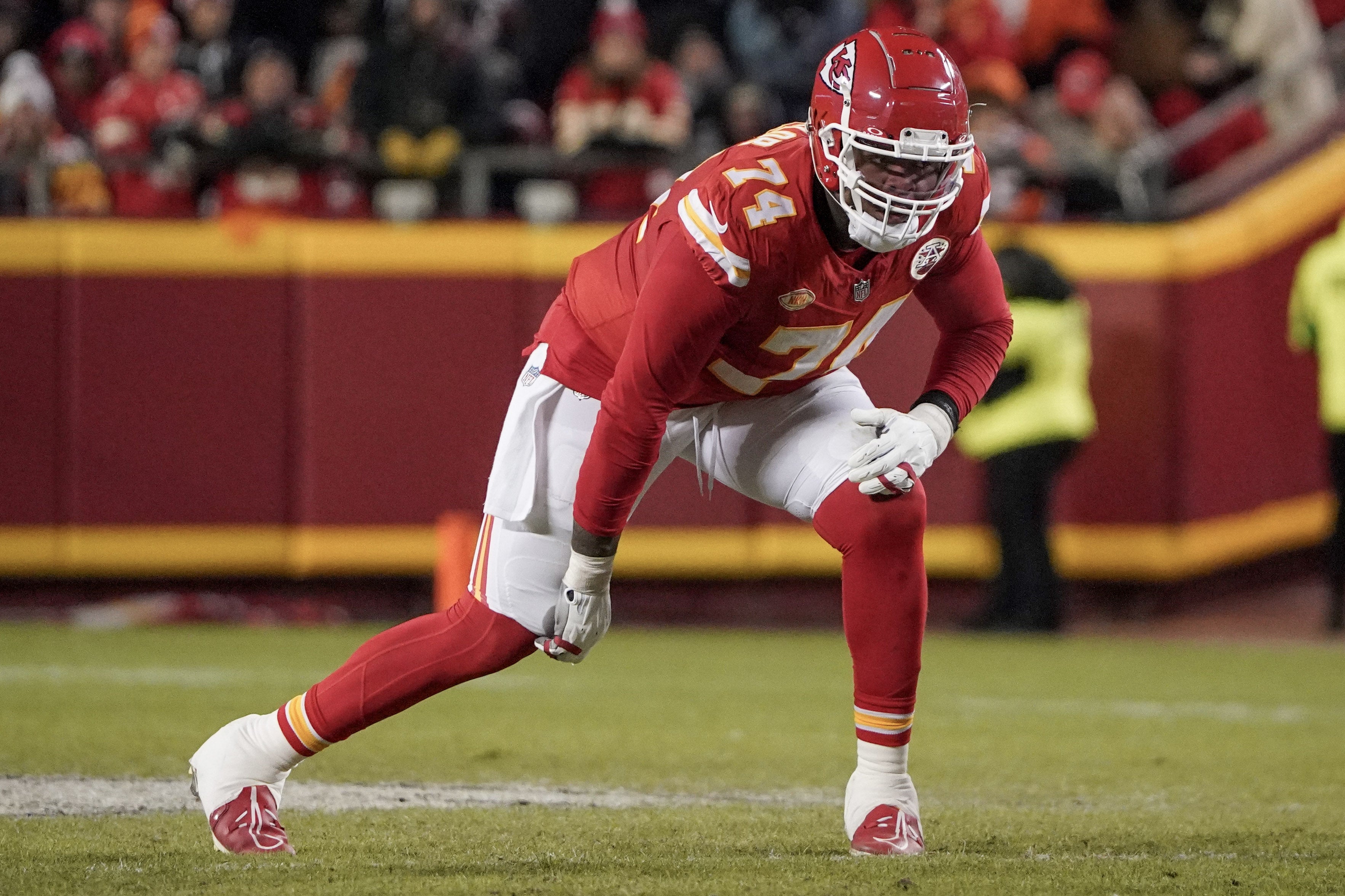 Dec 31, 2023; Kansas City, Missouri, USA; Kansas City Chiefs offensive tackle Jawaan Taylor (74) at the line of scrimmage against the Cincinnati Bengals during the game at GEHA Field at Arrowhead Stadium.